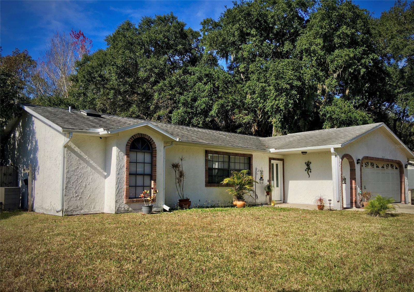 Lovely, well cared for 3 bedroom/2 bath home in Florida Shores with two car garage. Large private backyard has a partial area with chain link fence enclosure for dog/pet area.  Enclosed Florida Room with A/C and tile floor.  Bright and Spacious Living Room with vaulted ceiling and large window that floods the room with light. Each bath has a skylight allowing natural light in.  Located in a neighborhood that has easy access to I-95, SR442, and US1.  Lots of shopping nearby for convenience. ;Water: City