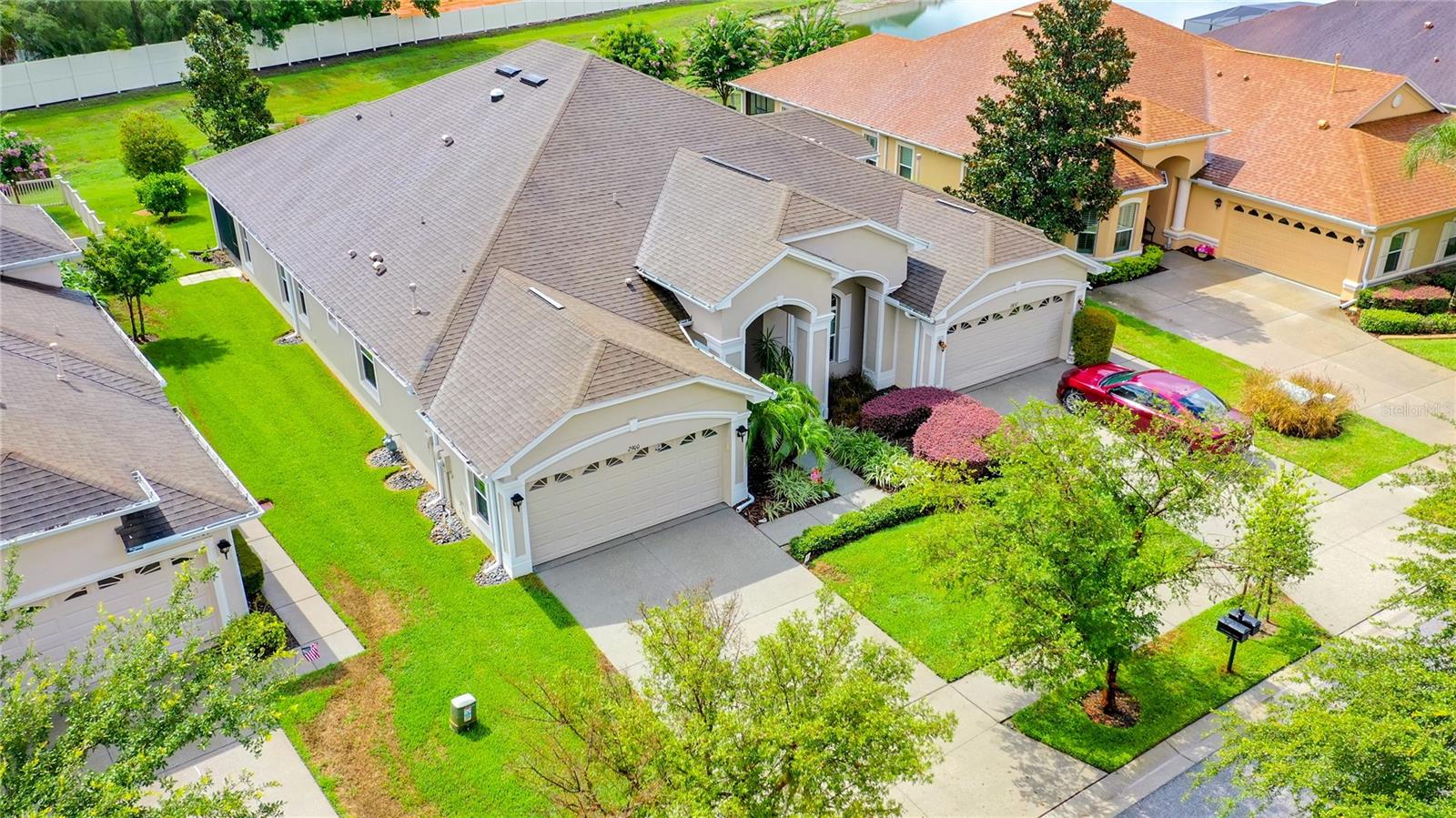 PRICE ADJUSTMENT- Immaculately maintained 3bedroom 2 bath 2013 Southern Crafted Villa located in Desirable Gated Community of Devonwood. This home lives larger than it's approx 1800 sf ft of living space! As you enter you will immediately notice the Volume ceilings, Tray Ceiling in the Separate Dining Room, the Designer tile flooring extends into the Kitchen and Great Room, the Gourmet Kitchen has Granite Countertops, all Stainless Appliances with Double Convection Oven, Upgraded lighting, staggered Wood Cabinets with Crown Moulding, stone backsplash, Walkin Pantry w Designer Glass Door & under cabinet lighting! This home has a Gas Water Heater and the Stove is stubbed out for a future Gas Stove if the buyer desires to put one in. No detail has been left out of this great home, it's Light & Bright with Added Solar Tube in the Kitchen and Double Paned windows throughout, Ceiling fans in every bedroom, Great Room and Lanai.  The Master Bedroom is equipped with a designer light and hidden ceiling fan- truly must see to believe! The Master Bathroom has an Oversized Shower and is equipped with Designer accessibility bar both (both bathrooms are equipped)Double Sinks and Large Walk In closet. Closets are built out with Organizers and Shelving for maximum space utilization.  The Secondary Bedrooms are spacious and Split from the Master for privacy.  The Great Room Overlooks the Scenic Backyard, Enjoy your morning Coffee from the Screened Truss Covered Lanai (plumbed for gas)!  Other upgrades include Water Filtration system, Water Softener, Sink in the Garage, Inside Laundry Room with Shelving and so much more! No CDD, No Flood Insurance required. Great Location near S.R 54 and US 41 (Dale Mabrey)10 minutes to the Suncoast Expway, close to Medical, Schools, Shopping and More! One low Quarterly Fee includes. Basic Cable, Internet, Lawn cutting, trimming, Sprinkler Maintenance, Exterior Painting, Roof.  Seller will also offer $650.00 towards a home warranty of the buyers choice with an acceptable offer. Truly Florida Style Living at it's Finest.  Call Today!