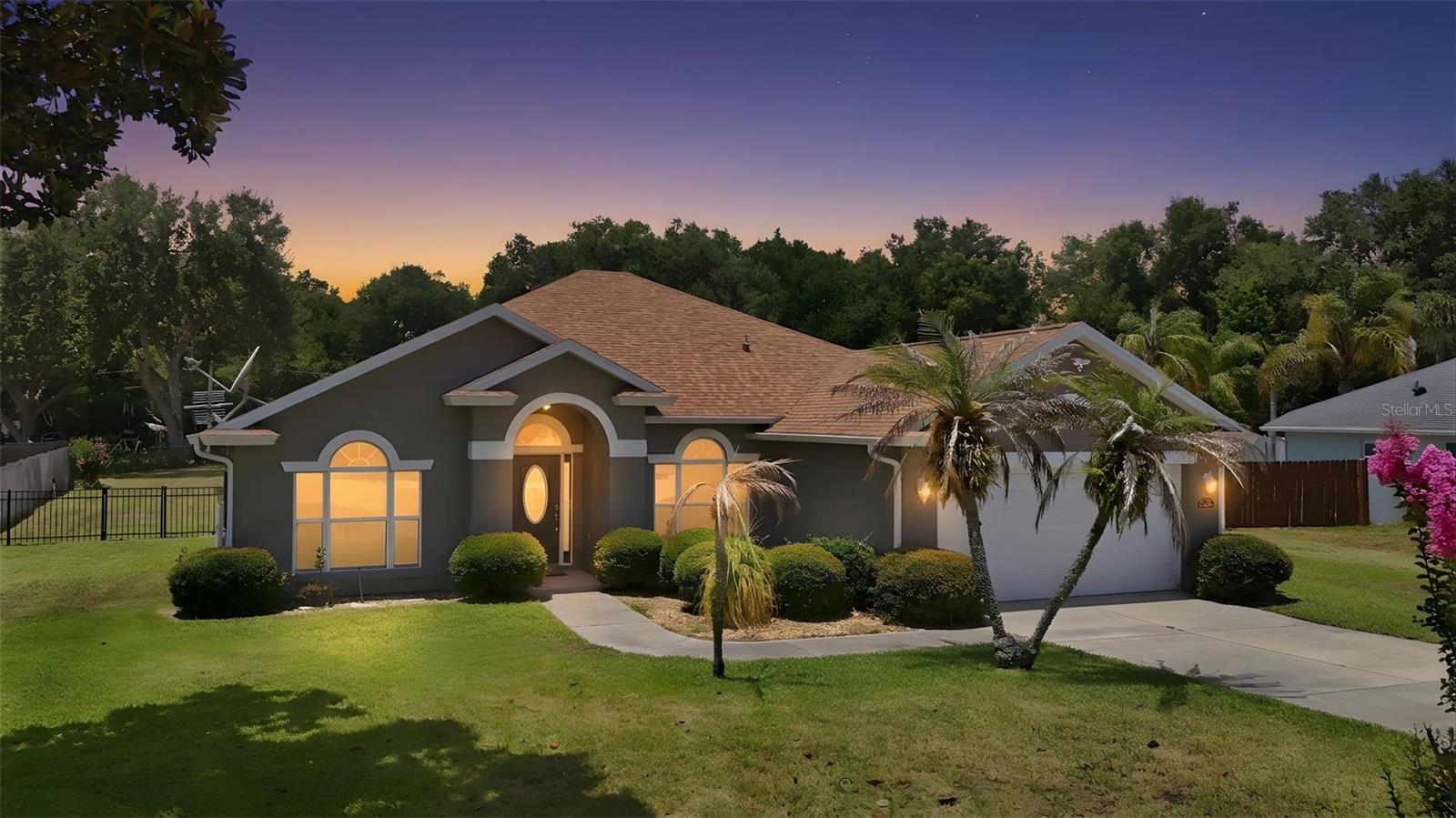 Bring the RV, boat, and all the toys! This 3-bedroom, 2-bath home offers 1,940 square feet of living space, a desirable split floor plan, and sits on a hard-to-find half-acre lot with rear access from a separate street.

The backyard is the real highlight, offering plenty of room for recreational vehicles, trailers, work equipment, gardening, or simply enjoying the extra space. A storage shed provides additional room for tools and outdoor equipment.

Love being on the water? Residents enjoy access to the community boat ramp with access to Lake Yale, making it easy to spend weekends fishing, boating, and enjoying everything Florida living has to offer.

Inside, the split-bedroom layout provides privacy for the primary suite while still offering comfortable gathering spaces for family and friends. If you're looking for space, flexibility, and a property that gives you options both inside and out, this Grand Island home is worth a closer look.