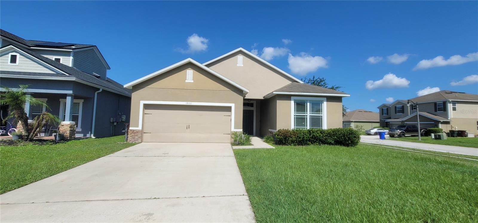 Welcome to this beautifully maintained 3-bedroom, 2-bath home with a 2-car garage, located in a desirable St. Cloud community. Built in 2009, this home features tall ceilings, an open-concept floor plan, and laminate and tile flooring throughout for easy maintenance and modern living.

The spacious kitchen comes fully equipped with all major appliances, including a range/oven, refrigerator, dishwasher, microwave, as well as a washer and dryer for added convenience. The open layout creates the perfect space for entertaining family and friends while maintaining a comfortable flow throughout the home.

Step outside to enjoy the fully fenced backyard, ideal for pets, outdoor gatherings, or simply relaxing in your private outdoor space.

Residents of this community enjoy access to outstanding amenities, including a clubhouse, community pool, parks, playgrounds, and scenic walking paths. Conveniently located near Florida's Turnpike, major shopping centers, restaurants, schools, and entertainment venues, this home offers both comfort and convenience.

Don't miss this opportunity! Schedule your private tour today and see all that this wonderful home has .