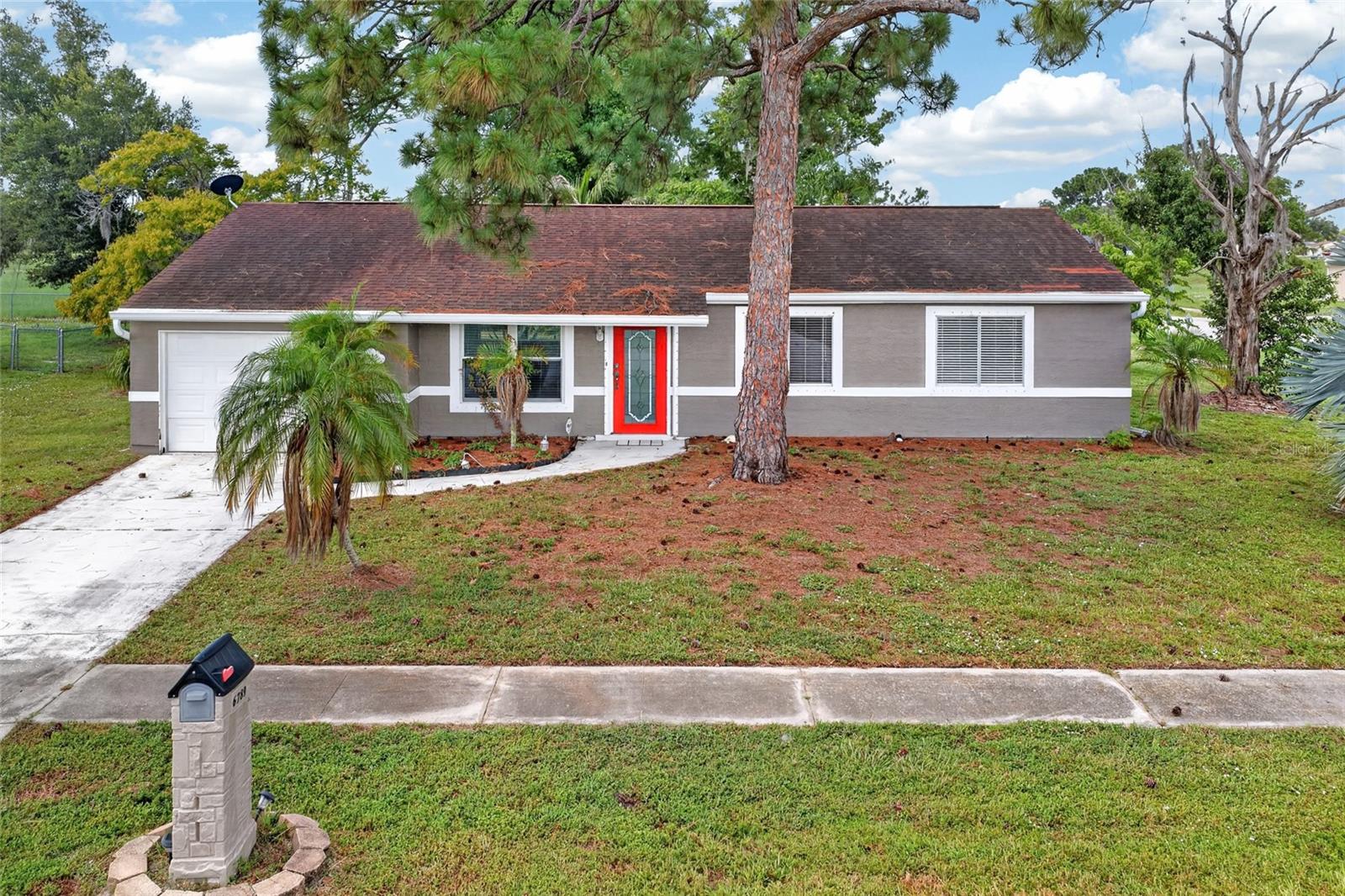 OPEN-CONCEPT LIVING ON A SPACIOUS CORNER LOT! Tucked away on a quiet cul-de-sac in a peaceful North Port neighborhood, this beautifully maintained 3-bedroom, 2-bathroom, 1-car garage home offers an inviting open layout, stylish updates, and comfortable Florida living—all on a desirable corner lot.

Step inside through the welcoming foyer and immediately appreciate the home's bright, open-concept design, where the living, dining, and kitchen areas flow seamlessly together to create the perfect space for everyday living and entertaining. Luxury vinyl plank flooring extends throughout the main living areas and bedrooms, while tile flooring in the bathrooms and Florida room adds both durability and style.

The spacious kitchen offers ample counter space, abundant cabinetry, and a full appliance package, making meal preparation both functional and enjoyable while remaining connected to the heart of the home.

The split-bedroom floor plan provides privacy for everyone. The generously sized primary suite features a private ensuite bathroom and a built-in closet, creating a comfortable retreat at the end of the day. Two additional bedrooms, each with built-in closets, offer flexibility for family, guests, or a home office.

A standout feature of the home is the Florida room, providing additional living space filled with natural light. Whether you envision a cozy sitting area, game room, home gym, or hobby space, this versatile room offers endless possibilities while allowing you to enjoy Florida living year-round.

Outside, the spacious yard provides plenty of room for gardening, pets, or simply relaxing outdoors, while the attached one-car garage with garage door opener offers additional storage and convenience.

Located in a pet-friendly HOA community, this home is just minutes from schools, shopping, dining, parks, golf courses, medical facilities, and all of North Port's everyday conveniences. Whether you're searching for a full-time residence, seasonal getaway, or investment opportunity, this move-in-ready home offers the perfect combination of comfort, functionality, and location.

Don't miss your chance to own this charming North Port home—schedule your private showing today!