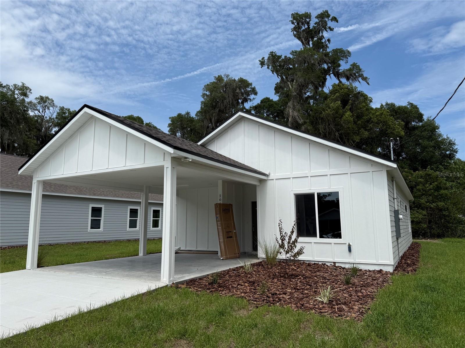 Escape the hustle and bustle in this beautifully completed, modern new-construction home. Uniquely situated in a quiet, tranquil area of Gainesville, this property feels like a hidden sanctuary away from the crowds, yet keeps city conveniences entirely within reach. It is a true haven for nature lovers and anglers alike, with Newnan’s Lake nearby and the abundance of Hawthorne's pristine lakes just a short drive away. The perfect blend of affordable modern living and outdoor lifestyle awaits you!