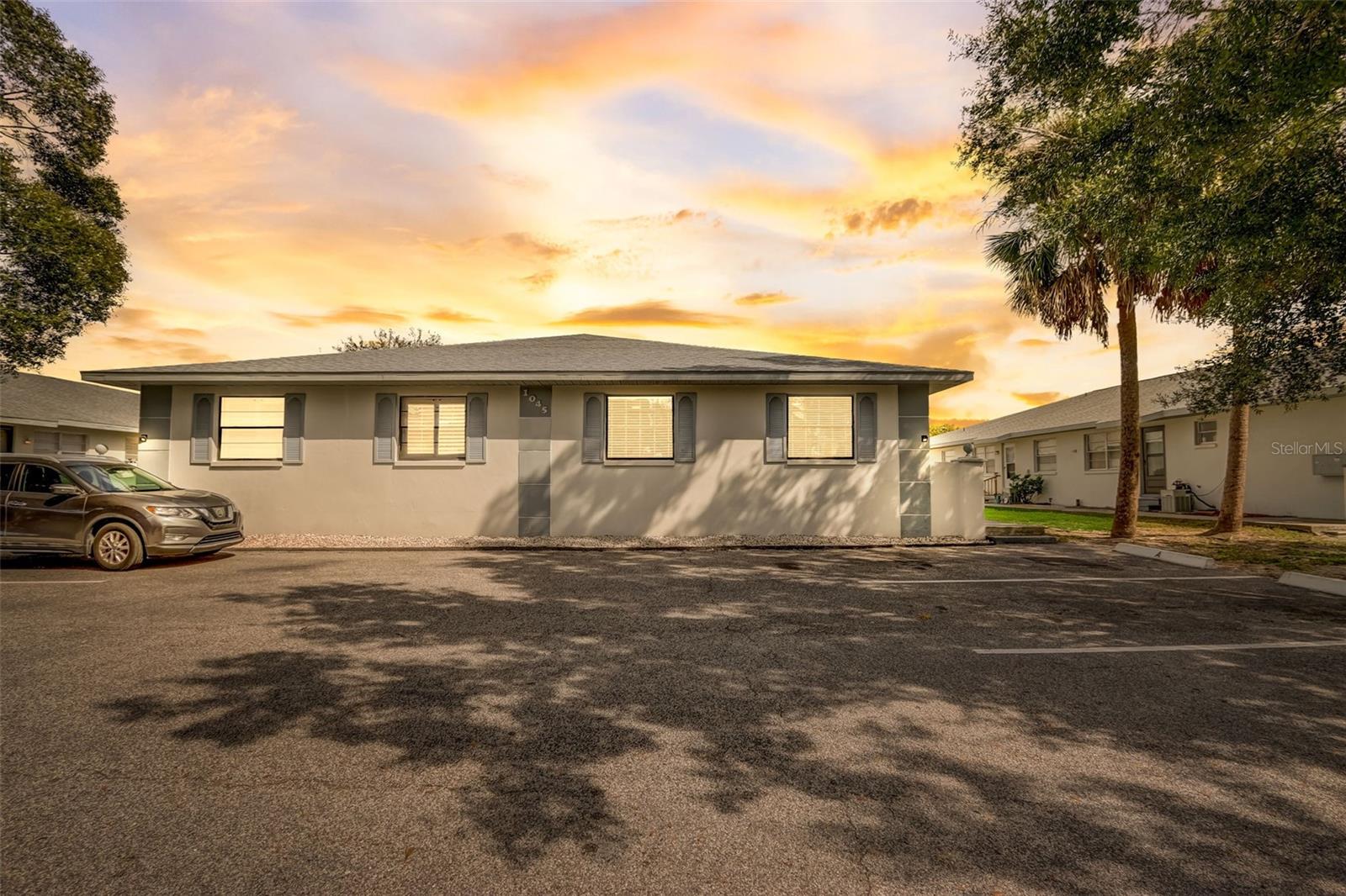 Welcome to the convenience of ground-level living with a zest of luxury on Apollo Beach Blvd! This isn't just any 2-bedroom, 1-bathroom condo; it's a unicorn in the wild world of real estate – as rare as a quiet day in Florida during tourist season.
Situated in the heart of Apollo Beach, you're so close to the marina that you'll feel the sea breeze on your face faster than you can say 'Walk to Circles Waterfront Restaurant.' And with beaches and boating options aplenty, every day feels like a mini-vacation.
Step into a fully updated unit where the kitchen is so sleek and new, you'll wonder if it was crafted by fairy-tale elves. Beautiful wood cabinets, Quartz countertops that mimic marble without the royal price tag, and stainless steel appliances that shine brighter than a Florida summer day.
Fancy a little soiree? The café style eating area is ready for whatever shindigs or serene suppers you've got in mind, and the spacious living room is the perfect backdrop for your best 'lounging in luxury' Instagram post.
Sipping your morning brew gets a serious upgrade canalside. Just steps from your front door and you have views of the saltwater canal that’ll have you bragging to your friends up north. And let's not forget the sunsets, which are nothing short of a nightly nature show.
Move-in ready? You betcha! With updates galore, including a modern tile woodlook floor that's as chic as it is clean, fresh paint, and fancy new shower that's always hot to trot, you're all set. Even the light fixtures are so new and shiny, you'll need shades.
Oh, and if you're into seamless transitions, the furniture can be yours for a full price offer– because who doesn't love a good deal? Parking woes be gone, with two (2) private spots just for you, no valet required.
This isn't just a condo; it's a 'hurry up before everyone else figures out how awesome this place is' kind of deal. So, come on down, take a tour, and fall in love with where you could be binge-watching your next favorite show. Schedule your showing today – your future 'home sweet home' awaits!