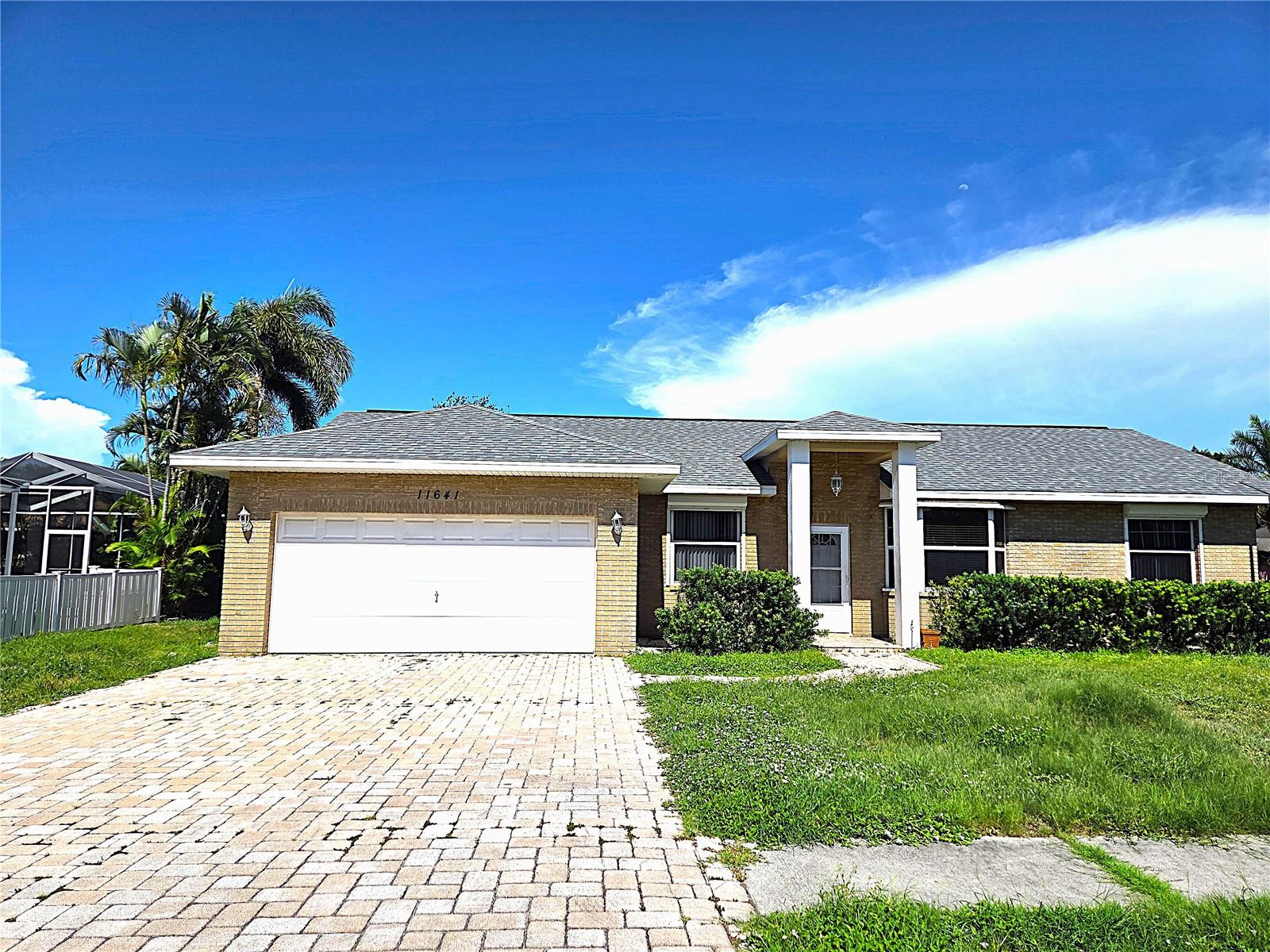 Welcome to your dream modern home built in 1998, a beautifully updated property offering comfort, style, and unbeatable location in the heart of Pinellas County. This spacious 4-bedroom, 2-bathroom 2 car garage home features approximately 1,590 sq ft of living space, perfect for families or anyone looking for room to grow. Step inside to find laminate flooring and fresh interior paint, creating a clean, modern feel throughout with high ceiling. There are brand new stove and refrigerator. Situated on a desirable corner lot, this property offers added privacy and curb appeal. The two-car garage provides ample parking and storage, while the large backyard shed is perfect for tools, hobbies, or extra storage space. For added protection and convenience, the home is equipped with an automatic hurricane shutter system, a valuable feature for Florida living. Prime Location – Close to Everything! This home is ideally located near some of the best attractions and destinations in the Tampa Bay area: Enjoy nature and walking trails at Sawgrass Lake Park (approx. 5.6 miles) Explore beautiful gardens at Florida Botanical Gardens (approx. 8.5 miles), Spend your weekends at the world-famous Clearwater Beach (about 12 miles away) or Indian Rock Beach (5 miles), Visit waterfront shops, dining, and entertainment at John's Pass Village & Boardwalk (approx. 6 miles) and Experience art and culture at The Dalí Museum (under 7 miles). Living here means you’re just minutes from beaches, parks, shopping, dining, and major highways—making commuting to Tampa or downtown St. Petersburg quick and convenient.