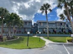 Turnkey! Enjoy living only 2 miles from Nokomis Beach! This community is quiet, well maintained with only 13 townhomes. You'll enjoy the brightness of this furnished home with cathedral ceilings. All floors are bamboo, the kitchen has cottage style cabinets, granite counter tops, and stainless-steel appliances. Ample size living/dining room with sliders to the lanai overlooking the pool and a golf course. You can choose your master bedroom upstairs or downstairs! Each bedroom has a joining bathroom and walk-in closet. Plantation shutters window treatments. Everything is updated in the last 9 years. The two-car garage is oversized for additional storage. There is also an attic space for more storage! You'll love the location near shopping, Venice, 681 to I75 in 5 minutes, 2 miles to Nokomis Beach, and waterside restaurants.