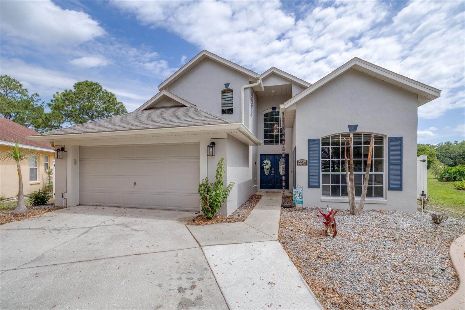 Welcome to this beautiful 4 bedroom, 2.5 bathroom home located in the golf course community of Southern Dunes! Featuring a spacious layout perfect for everyday living and entertaining, this home offers comfortable living spaces and kitchen/dining spaces. The primary bedroom and bathroom are conveniently located on the first floor along with a half bathroom for guests and a laundry room. Upstairs you will find 3 bedrooms and a guest bath. From the backyard, you can enjoy the lanai and pool while taking in the views of the golf course! The roof was replaced in 2022 and AC unit replaced in 2026. Situated near shopping and dining, this home and location are a must-see! The community features a golf course, clubhouse, pro shop, tennis courts, fitness center, and children's playground. Schedule your private tour today!