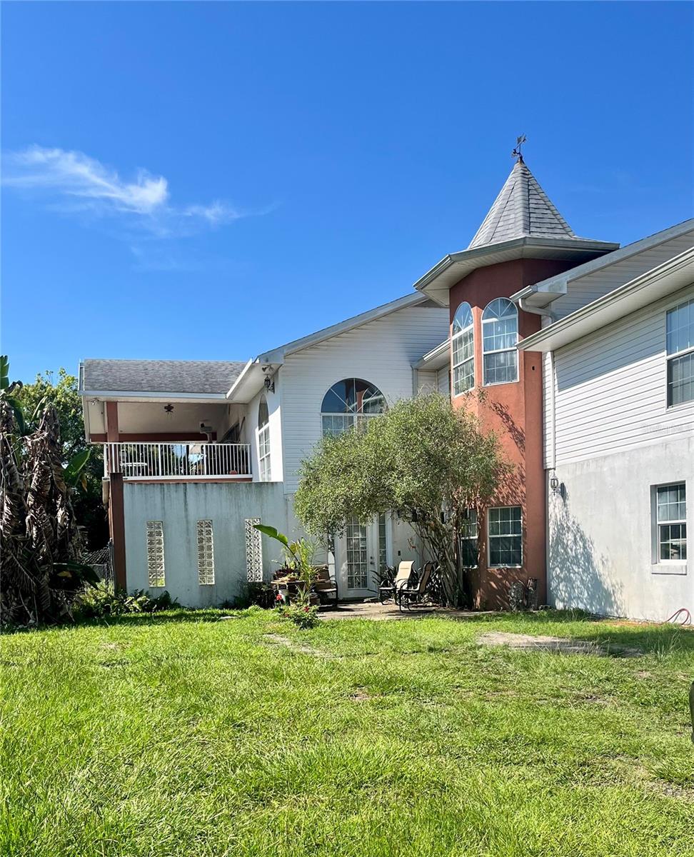 Located on a large corner lot on Riverside Drive. Two story with living area total over 6000 sq feet l and over 8000 total Multiple possibilities.  Large home in need of some TLC. Shown by appointment only.