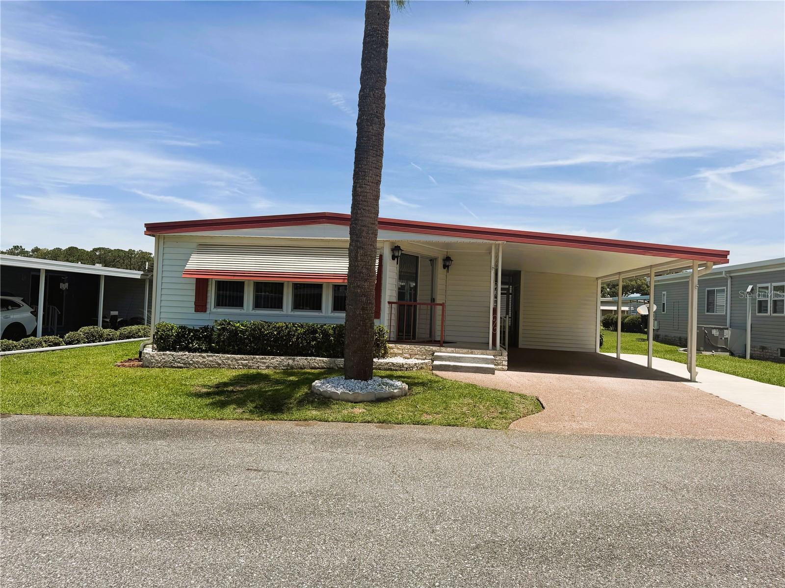 Beautifully Updated & Furnished 2-Bedroom, 2-Bath Home with Abundant Storage!
This well-maintained and move-in-ready 2-bedroom, 2-bath home offers the perfect combination of comfort, convenience, and valuable updates throughout. Being sold furnished, this home is ready for you to move in and start enjoying the Florida lifestyle right away.
Inside, you'll find a thoughtfully designed floor plan with plenty of storage space throughout, making it easy to stay organized and keep everything within reach. The remodeled kitchen, completed in 2021, features updated cabinetry and finishes, while the appliances were replaced in 2019. New subfloors installed in April 2024 provide added durability and peace of mind. Additional interior improvements include a new washer and dryer (2024), new vertical blinds (November 2024), and energy-efficient double-pane windows installed in 2016.
Major system updates have already been completed, including a new A/C unit installed in January 2021 and a new water heater added in January 2025. The home was professionally releveled in May 2020, and the vapor barrier was repaired in November 2025, helping to protect and preserve the home's foundation.
Outside, you'll appreciate the concrete pad added in 2021, providing additional outdoor functionality, and the new front steps installed in April 2025 that enhance both accessibility and curb appeal.
Located in Hawthorne at Leesburg, a vibrant 55+ community that blends comfort, convenience, and affordability, residents enjoy a maintenance-free lifestyle for just $397 a month. The monthly fee includes water, sewer, lawn care, emergency services, and access to an impressive array of resort-style amenities, including secure RV and boat storage.
The expansive clubhouse serves as the social heart of the community, featuring over 100 organized activities, a welcoming lounge, card rooms, billiards, a fitness center, library, and fine arts studio. A dedicated program coordinator ensures there is always something exciting on the calendar. Boating enthusiasts will appreciate the private marina with 120 boat slips offering direct access to the beautiful Harris Chain of Lakes.
Safety and peace of mind are top priorities, with a 24/7 on-site team of state-certified firefighter/EMTs, emergency vehicles, and in-home emergency response buttons. Residents also enjoy scenic walking trails, beautiful lake views, fishing, boating, and golf cart-friendly streets that provide easy access to nearby shopping, dining, and medical facilities.
With its extensive list of upgrades, abundant storage, excellent maintenance history, and desirable location within one of Central Florida's premier active adult communities, this home offers an exceptional opportunity to enjoy the very best of Florida living. Schedule your private showing today and discover the perfect blend of comfort, community, and convenience.