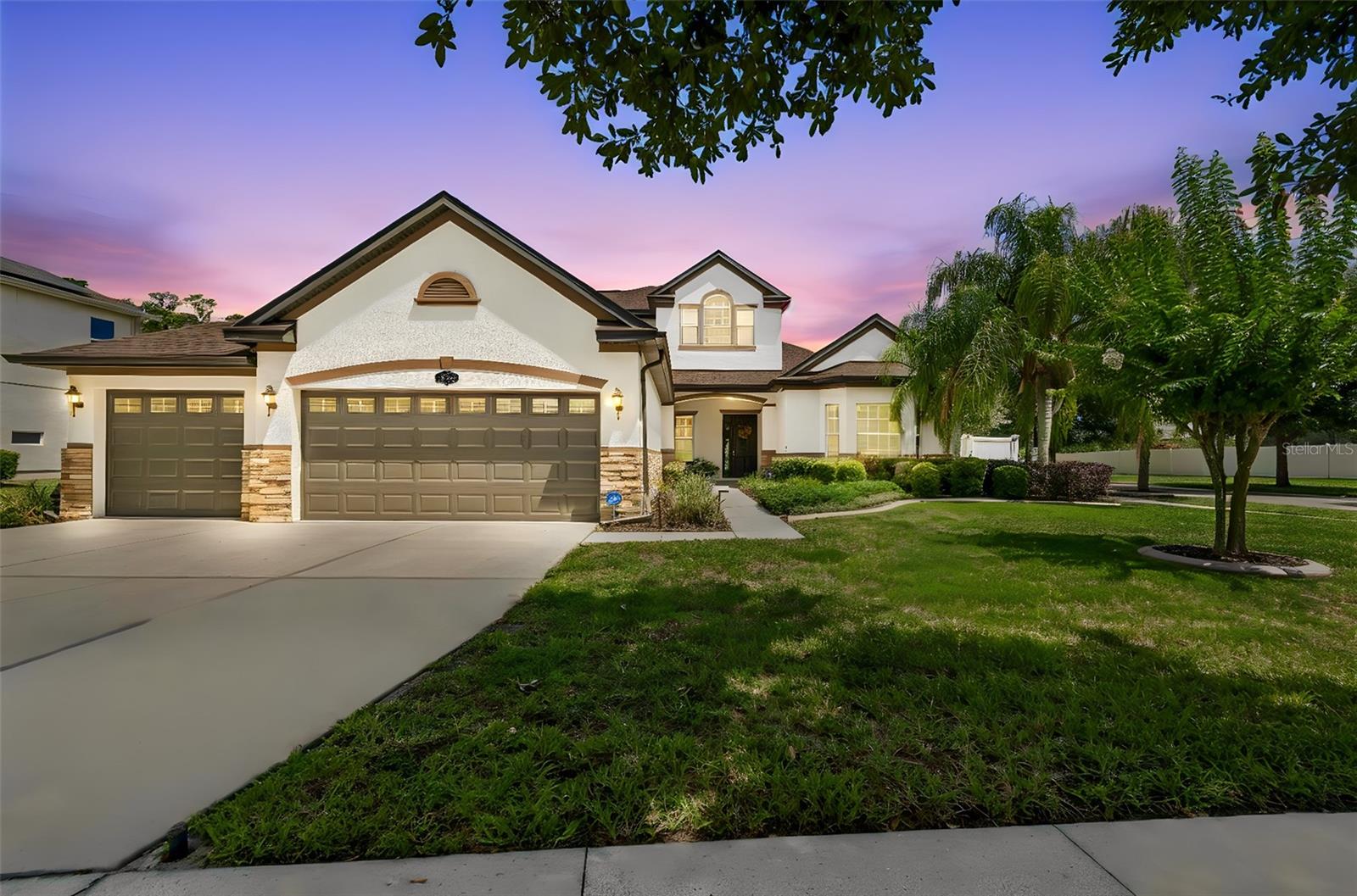 Calling all car enthusiasts, collectors, entertainers, and hobbyists—this rare Tampa property features a climate-controlled 1,309 sq. ft. 6-CAR GARAGE! with its own air condition, creating the ultimate space for your collection, workshop, or additional storage. Complementing this incredible garage is a huge walk-in attic spanning nearly the entire length of the structure.

Welcome to beautiful Bassett Creek Estates, where luxury, privacy, and functionality come together on a beautifully maintained 0.40-acre corner lot.

This impressive 3,803-square-foot residence offers 4 spacious bedrooms, 4 full bathrooms, a dedicated office/bonus room, and an expansive 890 sq. ft. loft complete with a kitchenette. Whether used as a media room, game room, guest retreat, in-law suite, home office, or fitness studio, this versatile space offers exceptional flexibility to fit your lifestyle.

The spacious primary suite serves as a private retreat featuring dual vanities, a large walk-in shower, and a thoughtfully designed layout that combines comfort and functionality.

Soaring ceilings and large windows fill the home with natural Florida sunshine, creating an open and inviting atmosphere throughout. Every full bathroom includes its own shower, providing convenience for family members and guests alike.

Large glass sliding doors open to your private backyard RESORT OASIS featuring a beautifully maintained swimming pool, commercial-grade spa, fully equipped outdoor kitchen, and extensive shaded outdoor living space. Custom color-matching awnings extend from the home toward the pool area, creating the perfect setting for entertaining, relaxing, and enjoying Florida's year-round outdoor lifestyle.

One of the property's most unique features is its tranquil estuary view, providing a peaceful natural backdrop and a heightened sense of privacy rarely found within a neighborhood setting. Surrounded by mature landscaping and a new privacy fence, the backyard feels like a secluded retreat.

Recent improvements include a new roof with premium architectural shingles, fresh paint, new flooring, a new water heater, upgraded pool equipment, new privacy fence and beautifully maintained landscaping.

Conveniently located near premier shopping, restaurants, fine dining, entertainment, and major commuter routes, this exceptional property offers the perfect balance of privacy and accessibility.

Residents will also enjoy access to the area's recently completed $8.7 million community enhancement project featuring a brand-new 16,000-square-foot community center and gymnasium, fitness room, multipurpose rooms, classrooms, covered outdoor gathering spaces, a state-of-the-art playground, walking paths, pavilion, expanded green space, and additional parking.

Priced below its 2025 professional appraisal, this exceptional property presents a unique opportunity for buyers seeking luxury, functionality, and long-term value in one of Tampa's most desirable communities.

This extraordinary Bassett Creek Estates residence offers the perfect blend of luxury living, outdoor enjoyment, privacy, storage, and versatility.