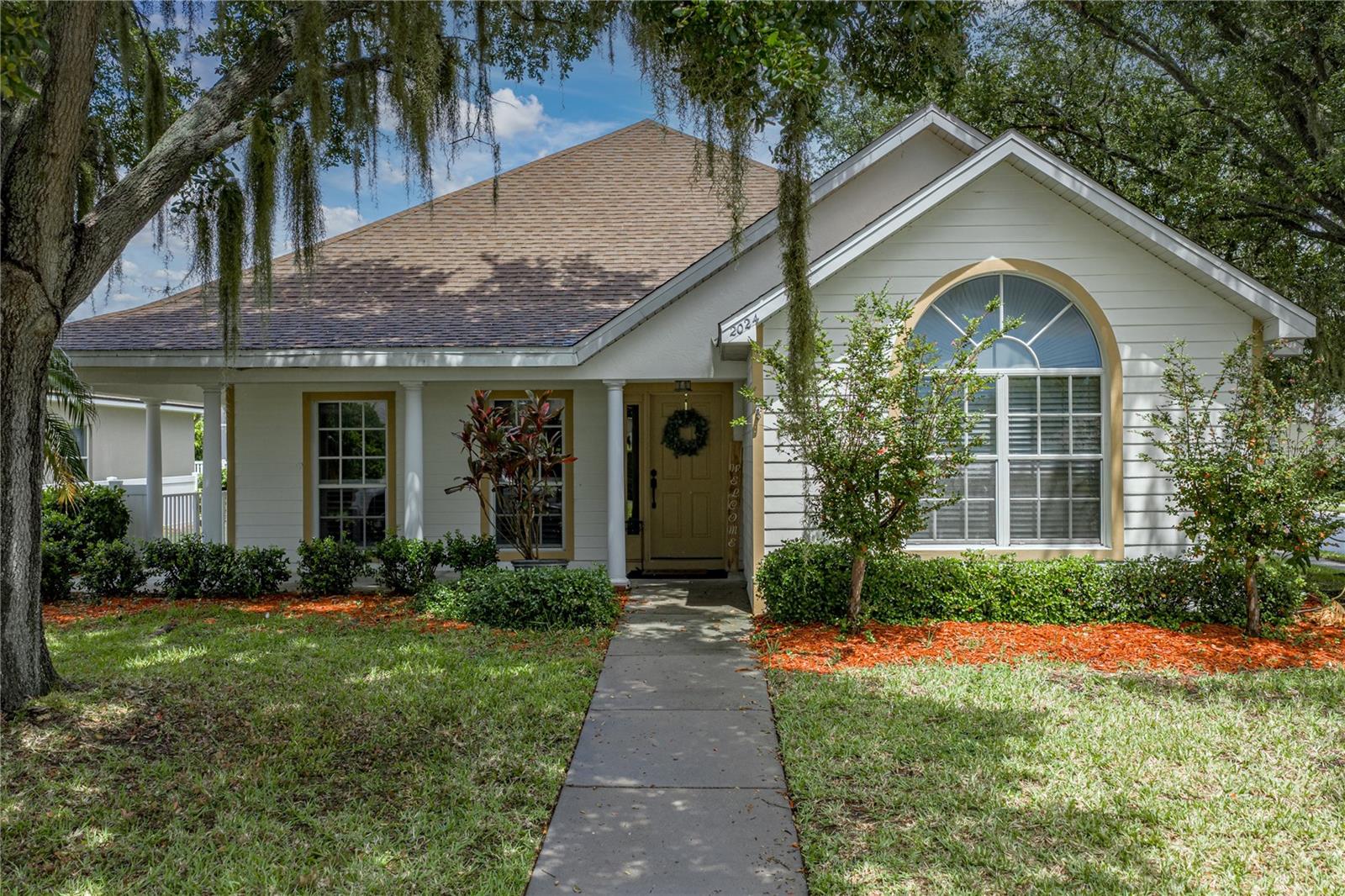 Welcome to 2024 Larkspur Court in the highly desirable Fox Wood community of Trinity! This custom built, 4 bedroom, 2 bath home offers approximately 2,287 square feet of living space, offers an exceptional floor plan and dramatic high ceilings. As you enter, you'll immediately notice the spacious formal living room, architectural high ceiling, abundance of natural light, and open layout. As you enter the great room, you immediately notice the very tall ceilings, fireplace and kitchen. The first floor owner's suite provides privacy and convenience, while two additional bedrooms and a full bath are also located downstairs. Upstairs, you'll find a versatile loft, desiged as the fourth bedroom that can serve as a home office, home theater, home schooling area, playroom, or guest retreat. Step outside and discover your own private Florida oasis featuring a screened in sparkling freeform pool, an inground spa, and expansive covered and pavered lanai, perfect for year round outdoor entertaining. The detached two-car garage, mature landscaping, irrigation system, and covered front porch add both charm. Off the covered porch and screened lanai is a Putt-putt artificial turf area perfect for practice or a dog run. HVAC and Water heaters are 2021. Your new home is NOT IN A FLOOD ZONE and located in the Fox Wood community, in the heart of Trinity. Residents seek this community because of it's gated security, top-rated schools, shopping, restaurants, medical facilities, Trinity Hospital, golf courses, and the Suncoast Parkway for an easy commute to Tampa International Airport and the Gulf beaches. If you've been searching for a home that combines space, flexibility, and resort-style outdoor living in one of Trinity's most desirable neighborhoods, 2024 Larkspur Court deserves a place at the top of your list. Schedule your private showing today! All measurements are to the nearest foot and are not guaranteed.