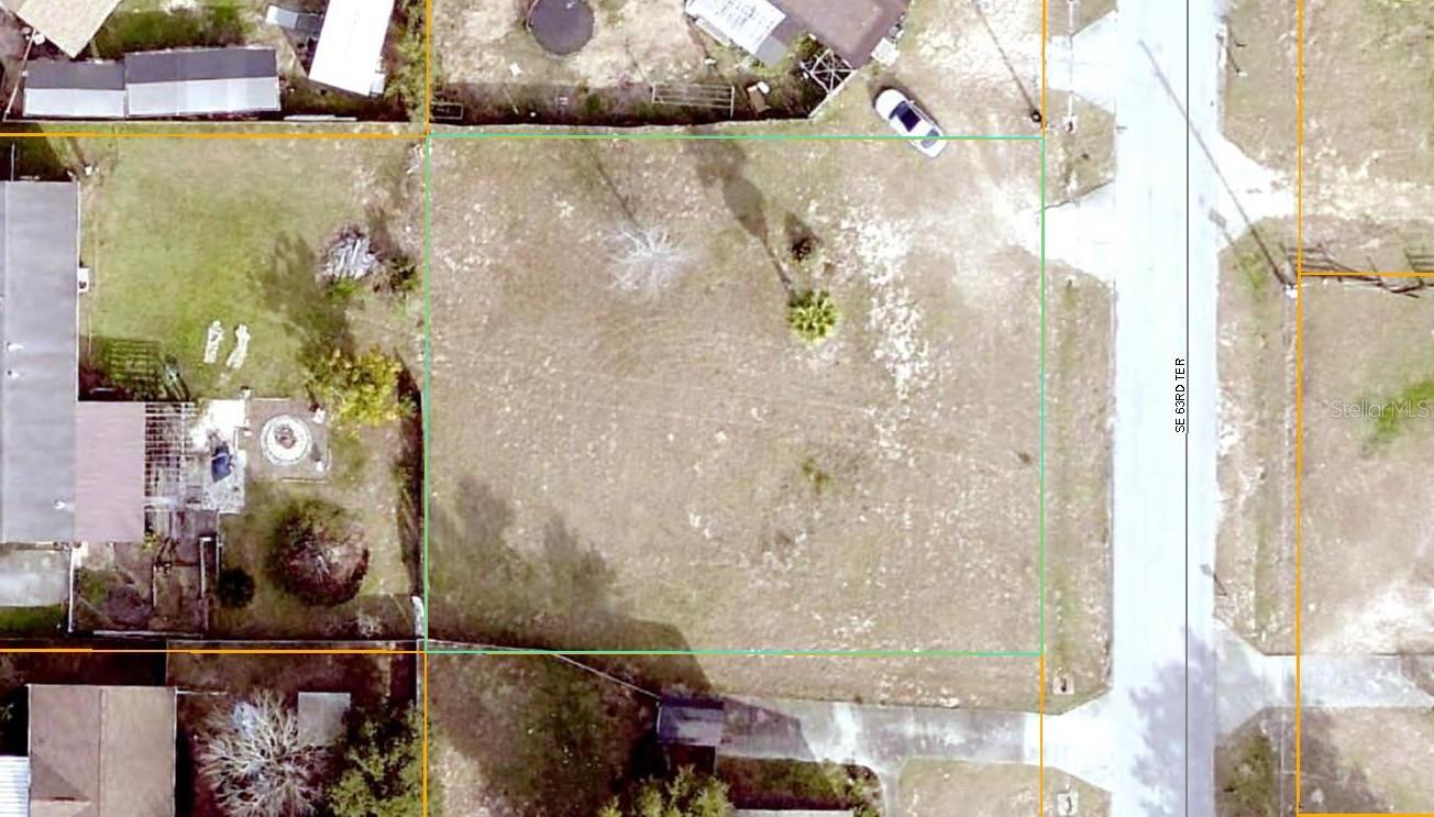 Nicel lot with 100 ft of paved road frontage and No HOA! Located just off of HWY 301 in a great residential area that is close to The Villages for shopping, dining and entertainment. You choose the builder and when you want to build.