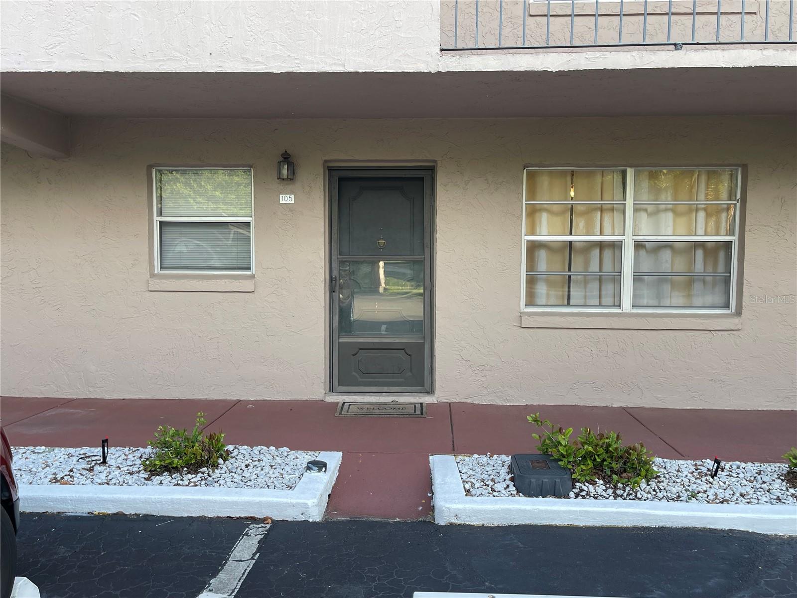 Discover this charming first-floor corner unit condo in the highly sought after Orchid Springs community in SE WInter Haven.  This 2 bedroom 2 bathroom condo features a desirable split floor plan with an oversized living area perfect for entertaining or relaxing. Both bedrooms boast generous walk-in closets , and offers abundant storage throughout.  Enjoy the convenience of a first floor corner location with a covered parking spot.  The nice open layout makes every day maintenance free living easy and comfortable. Residents of Orchid Springs love the prime location minutes from shopping,dining, medical facilities,  and Legoland, while being centrally situated between Tampa and Orlando for easy access to everything Central Florida has to provide.  The HOA takes care of the details including grounds maintenance, water , sewer and gas giving you more time to enjoy the Florida Lifestyle. Whether you are looking for a primary residence or a winter retreat , this first floor corner unit is a fantastic opportunity in a desirable community.  Schedule your showing today and make this condo your new home!