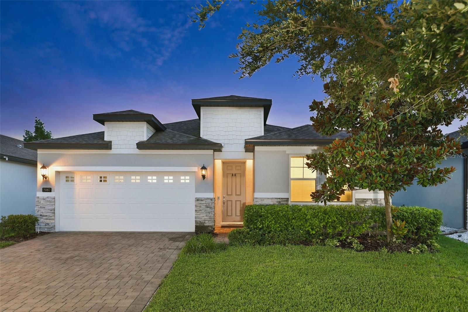 Nestled within the gated community of Hawks Crest, this thoughtfully designed single-story residence offers an exceptional blend of comfort, style and convenience in the heart of Winter Park. Spanning 1,920 square feet, this home features an open-concept floor plan that seamlessly connects the living, dining and kitchen areas, creating an inviting setting for both everyday living and entertaining. The kitchen serves as the centerpiece of the home, appointed with granite countertops, stainless steel appliances and a spacious center island with seating. The private owner's suite offers a walk-in closet and a well-appointed bath, while three additional bedrooms provide flexibility for guests, a home office or evolving lifestyle needs. A covered lanai overlooks the tranquil pond, creating the perfect backdrop for outdoor relaxation and year-round Florida living. Residents of Hawks Crest enjoy access to an impressive collection of amenities, including a clubhouse, fitness center, resort-style pool, splash pad, dog park, playgrounds, virtual guard gate and private access to Lake Howell for kayaking and paddleboarding. Ideally located just minutes from highways, Park Avenue, downtown Maitland, top-rated schools, Foxtail Coffee and Kelly's Ice Cream, this residence offers the opportunity to enjoy one of Winter Park's most sought-after gated communities.