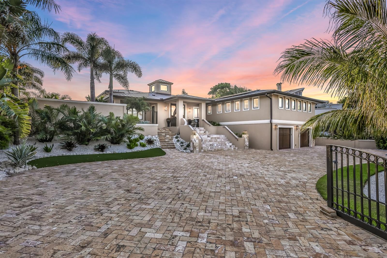 1 million below appraised value! 
Limited time exclusive opportunity that will not be available for long.

Turn key, FULLY furnished, spectacular direct intracoastal gated waterfront oasis in beautiful New Smyrna Beach, Florida.

This luxurious 5-bedroom, 5-bathroom home offers an unparalleled living experience, boasting breathtaking views of the water from every angle. 

Step inside and be greeted by an open-concept floor plan, designed to maximize both space and natural light. The grand living area features floor-to-ceiling windows, allowing you to enjoy the stunning panoramic views of the waterfront and surrounding landscape. 

The main floor gourmet kitchen is a chef's dream, equipped with top-of-the-line appliances, ample counter space, and a large island for both entertaining and culinary adventures. Overlooking the panoramic riverfront setting, you'll find an elegant dining area perfect for hosting memorable dinner parties with friends and family. 

The master suite is a true sanctuary, offering a private retreat with its own balcony overlooking the water. With a spacious walk-in closet and a luxurious ensuite bathroom, complete with a soaking tub and a separate shower, pampering yourself has never been easier. 

The four additional bedrooms are generously sized and feature their own en-suite bathrooms, ensuring everyone has their own private space. 

Outside, the expansive terrace is an entertainer's dream, complete with a pool, spa, and a covered patio area for outdoor dining and relaxation. The low maintenance lush landscaping adds to the overall ambiance, creating a serene and tranquil setting that will make you feel like you're on a never-ending vacation. 

Located in a highly coveted neighborhood, this grand waterfront home offers the perfect blend of luxury, comfort, and convenience. With easy access to nearby amenities, including renowned restaurants, shopping centers, and 2 blocks from pristine beaches, you'll have everything you need right at your doorstep. 

Don't miss out on the opportunity to own this extraordinary piece of paradise. Call to schedule a private showing and experience the grandeur of this waterfront gem firsthand.

TWO INDEPENDANT APPRAISALS AVAILABLE UPON REQUEST