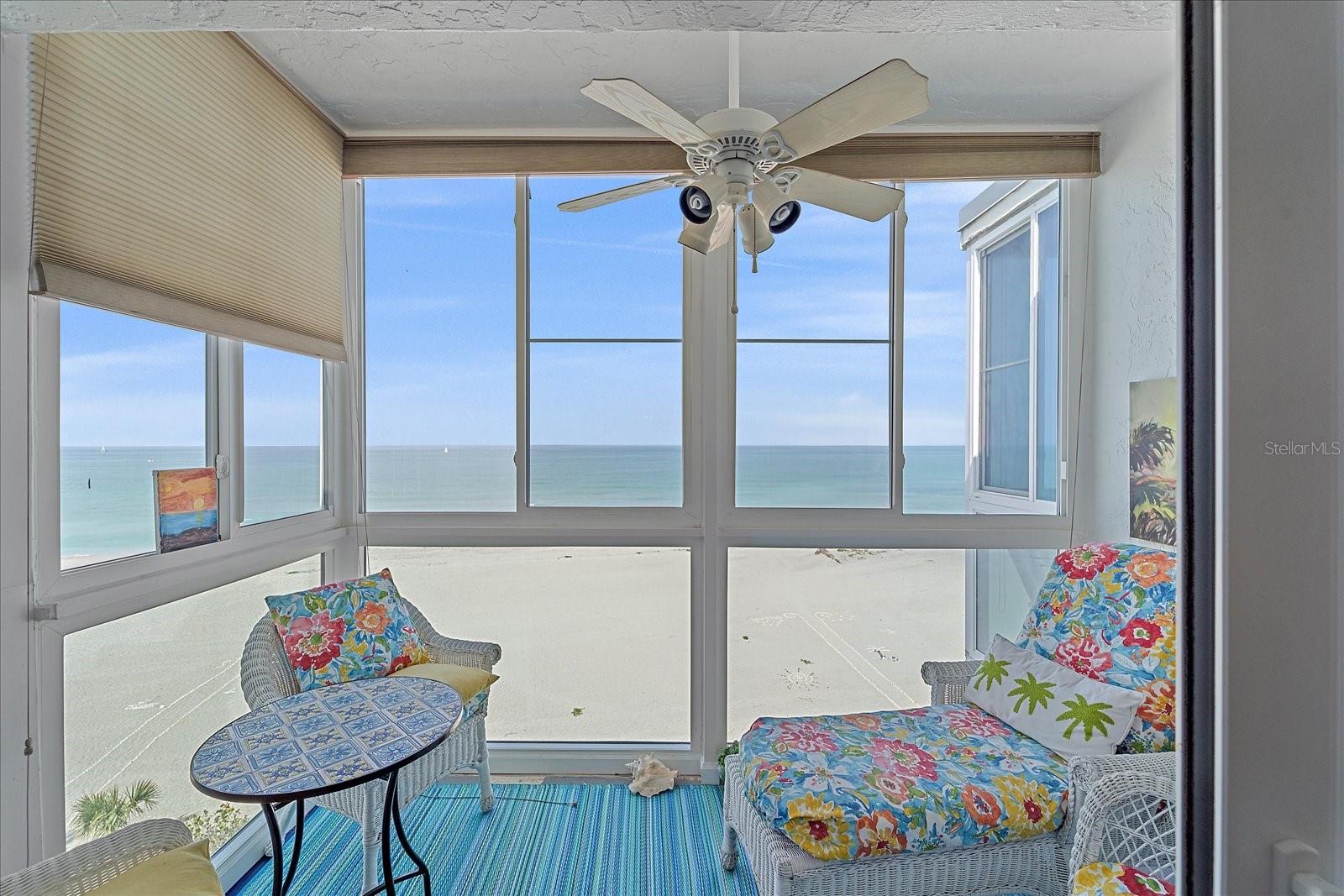 Experience coastal living at its finest in this top-floor, beachfront, turnkey-furnished condominium featuring unobstructed Gulf views and timeless style. The open-concept living and kitchen area is bright and inviting, enhanced by luxury vinyl plank flooring that flows seamlessly throughout. The kitchen is thoughtfully designed with granite countertops, white shaker cabinetry, and a functional layout perfect for both everyday living and entertaining. Both bedrooms offer updated en-suite bathrooms, providing comfort, privacy, and modern convenience. The sunlit living area serves as the heart of the home, showcasing breathtaking views of Venice Beach and creating a serene coastal retreat. Recent community and building updates include a new roof (2025), freshly painted exterior, a newly paved parking lot, a renovated club room, and impact windows installed in 2020. Ideally located near the Venice Jetty, the Venice Yacht Club, and the shops and dining of historic downtown Venice, this property offers the perfect balance of beachfront tranquility and vibrant coastal living.