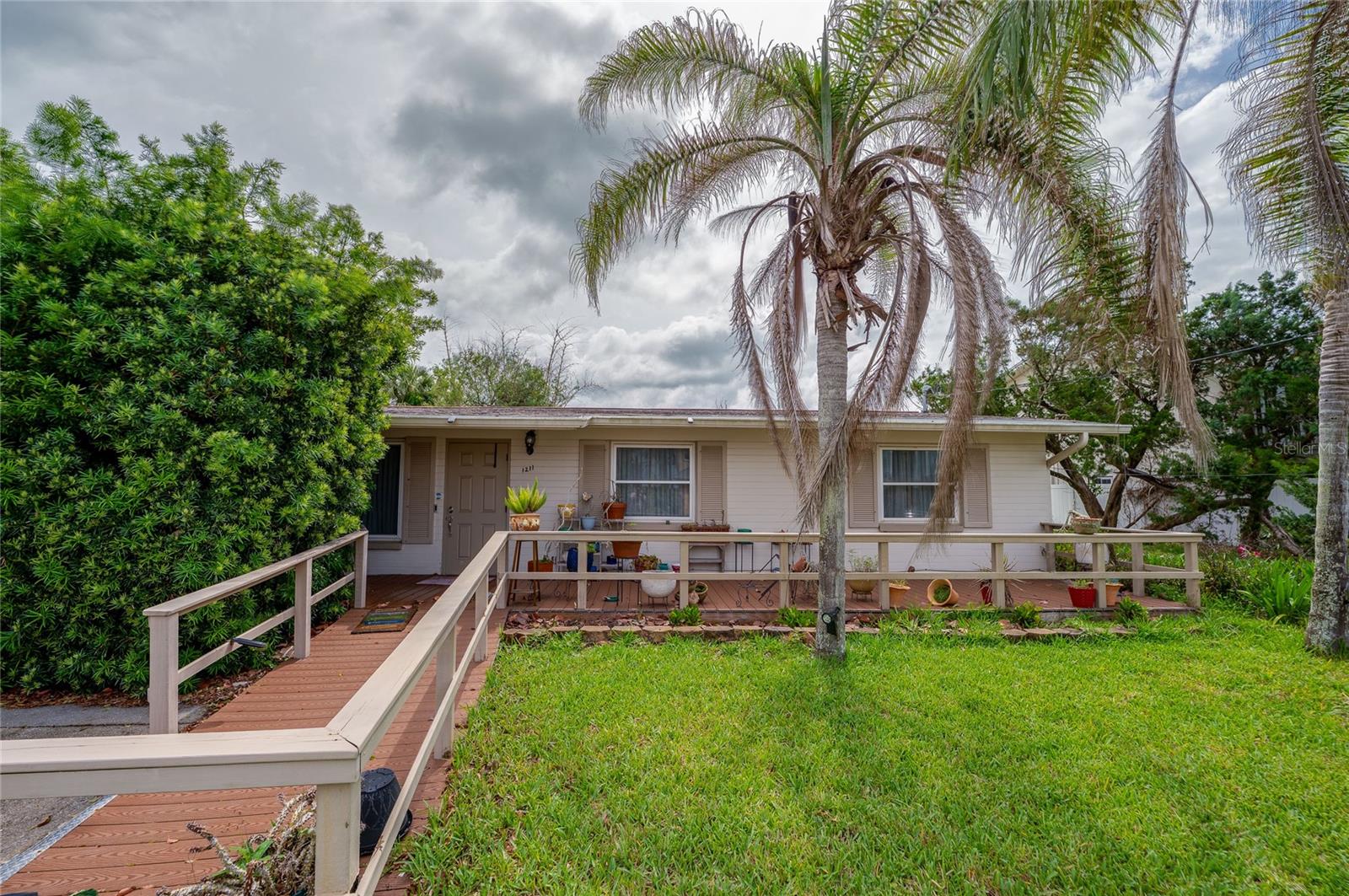 Great property in desired North Beach area of NSB.  Solid 3/2 block home on 100x125 lot.  2 large sheds in back; one shed has power.  Kitchen opens up to dining area.  Custom curtains in every room. Well on property for sprinkler irrigation. A short walk to the beach/ocean is a plus in this lovely neighborhood.  Just a few blocks north of Flagler Ave. for boutique shops and restaurants.  A whole house natural gas generator provides power if there is a strong enough storm.  Home sits on a high and dry lot that has not flooded. Seller states the roof waa replaced around 2021. ALL INFORMATION IS ASSUMED ACCURATE BUT NOT GUARANTEED.  ALL MEASUREMENTS ARE APPROXIMATE; BUYERS AND THEIR AGENTS SHALL VERIFY ANY INFORMATION DEEMED IMPORTANT TO THEM.