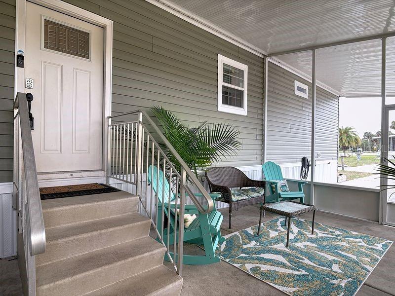 SELLER IS MOVATED TO SELL-MAJOR PRICE IMPROVEMENT!! You need to come see this beauty!  RETIREES, SNOWBIRDS, INVESTORS, and WATER LOVERS—THIS IS THE FLORIDA LIFESTLYE YOU HAVE BEEN WAITING FOR!!! 
Located in a SOUGHT-AFTER WATERFRONT community, this 2020-BUILT HOME sits on owned land (NO LOT RENT) and offers easy access to fishing, boating, kayaking, and paddleboarding. Watch DOLPHINS AND MANATEES from the community pier or launch your next adventure from the private boat ramp. This 3-bedroom, 2-bath home is MOVE-IN READY with numerous recent upgrades, including:
New METAL ROOF (2024) Additional CONCRETE PARKING PAD (2024) SMART THERMOSTAT (2025) NEW LAMINATE FLOORING in two bedrooms (2026). The open-concept floor plan features a spacious kitchen with abundant counter space, pantry, eat-in dining area, and breakfast bar overlooking the bright family room. As an added bonus, the sectional sofa, entertainment center, and wall-mounted TV convey with the home!  The primary suite accommodates a king-size bedroom set and includes a walk-in closet and private bath with a relaxing garden tub, separate walk-in shower with rain showerhead, and plenty of natural light. The split-bedroom design provides privacy for family or guests. A Sliding glass door leads to a fully fenced side yard, perfect for pets. The Community amenities include a Fishing pier
Boat ramp, swimming pool, clubhouse with kitchen, shuffleboard and bocce courts, and boat slips are available for an additional fee.
Conveniently located less than 10 minutes from shopping, restaurants, Publix, and DG Market, and only 15 MINUTES FROM NEW SMYRNA BEACH.  Don't miss this opportunity to own an affordable Florida home where every day feels like a vacation!