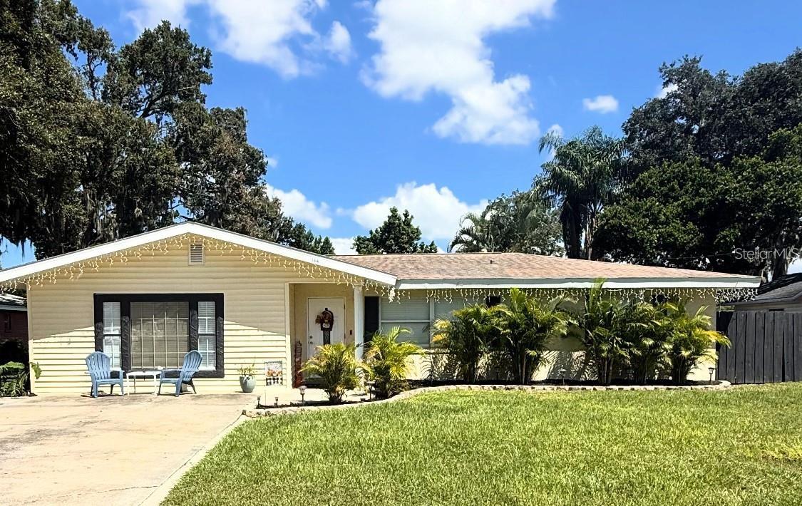 NO HOA + POOL HOME + MINUTES TO THE CHAIN OF LAKES! This updated 4-bedroom, 3-bath Winter Haven home delivers the Florida lifestyle buyers are searching for — a heated private pool, oversized fenced backyard, flexible living space, and quick access to the Lake Summit boat ramp and the Winter Haven Chain of Lakes. Bring the boat, jet skis, trailer, golf cart, pets, and weekend plans because this property gives you room to enjoy it all.

Inside, the home offers nearly 2,500 sq ft of living space with a bright, open feel, luxury vinyl flooring, oversized living and dining areas, and a beautifully updated kitchen featuring quartz countertops, custom soft-close cabinetry, stainless steel appliances, and a premium Ruvati workstation sink. The layout includes two private ensuite bedrooms, making it ideal for multigenerational living, guests, teenagers, extended family, or a private work-from-home setup.

The spacious primary suite feels like its own retreat with tray ceilings, a large walk-in closet, dual vanities, soaking tub, and walk-in shower. Step outside to the screened lanai overlooking the heated inground pool and large backyard — perfect for cookouts, pool days, entertaining, or quiet evenings after a day on the lakes. Boat ramp is only 2 blocks away.

Major updates include roof 2019, whole-house replumb 2019, AC handler 2019, water heater 2019, remodeled kitchen 2021, luxury vinyl flooring 2021, Raypak pool heater 2022, variable-speed pool pump 2024, irrigation system 2024, and guest bathroom remodel 2025. Located in desirable SE Winter Haven near Legoland, shopping, dining, medical, schools, and less than 2 minutes from Lake Summit boat ramp with access to the Chain of Lakes for boating, fishing, skiing, and waterfront dining. This is the kind of home that checks the boxes: updated, spacious, no HOA, pool, fenced yard, and close to the water.