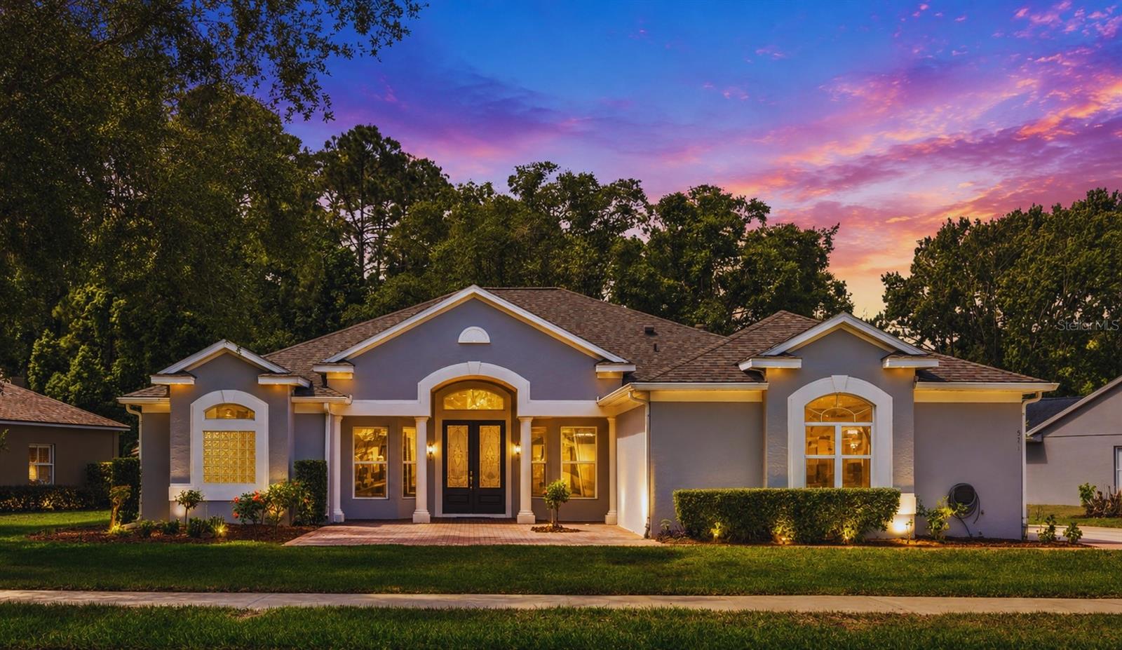 One or more photo(s) has been virtually staged. **$10,000 Credit to Buyer Closing Costs** MOVE-IN READY GOLF COMMUNITY HOME WITH CONSERVATION VIEWS IN THE HEART OF LAKE MARY! Experience the perfect blend of privacy, nature, and convenience in this beautifully updated one-story home located in the highly desirable Timacuan Golf & Country Club community. Backing to the Crystal Lake Conservation Area with no rear neighbors, this home offers a peaceful setting rarely found in Central Florida. Enjoy year-round outdoor living from the expansive 60-foot screened lanai, surrounded by mature landscaping, shade trees, and serene natural views—all with no backyard mowing required. Inside, nearly 2,600 square feet of thoughtfully designed living space features 3 spacious bedrooms, 3 full bathrooms, a dedicated private office, and a convenient guest half bath. The split floor plan provides privacy while the open-concept layout seamlessly connects the kitchen, family room, dining area, and outdoor living spaces. The updated kitchen serves as the heart of the home, showcasing quartz countertops, modern gray cabinetry, a large pantry, and stainless steel appliances. Fresh interior paint, elegant marble flooring, built-in surround sound, and a cozy wood-burning fireplace create a home that is both stylish and comfortable. Major updates provide peace of mind, including a new roof (2018), HVAC system (2017), renovated bathrooms, and an updated kitchen. Additional highlights include: an oversized 1/3-acre lot, fruit trees and mature landscaping, an EV-ready 220-volt garage outlet, a spacious two-car garage, and an extended driveway with parking for up to four additional vehicles. Located just minutes from top-rated schools, Publix, AdventHealth, Orlando Health, Colonial Town Park, Downtown Lake Mary, Interstate 4, and SR-417, this home combines natural beauty with exceptional convenience. Priced below recent appraisal value, this is a rare opportunity to own a meticulously maintained home in one of Lake Mary's most sought-after communities. Schedule your private showing today!