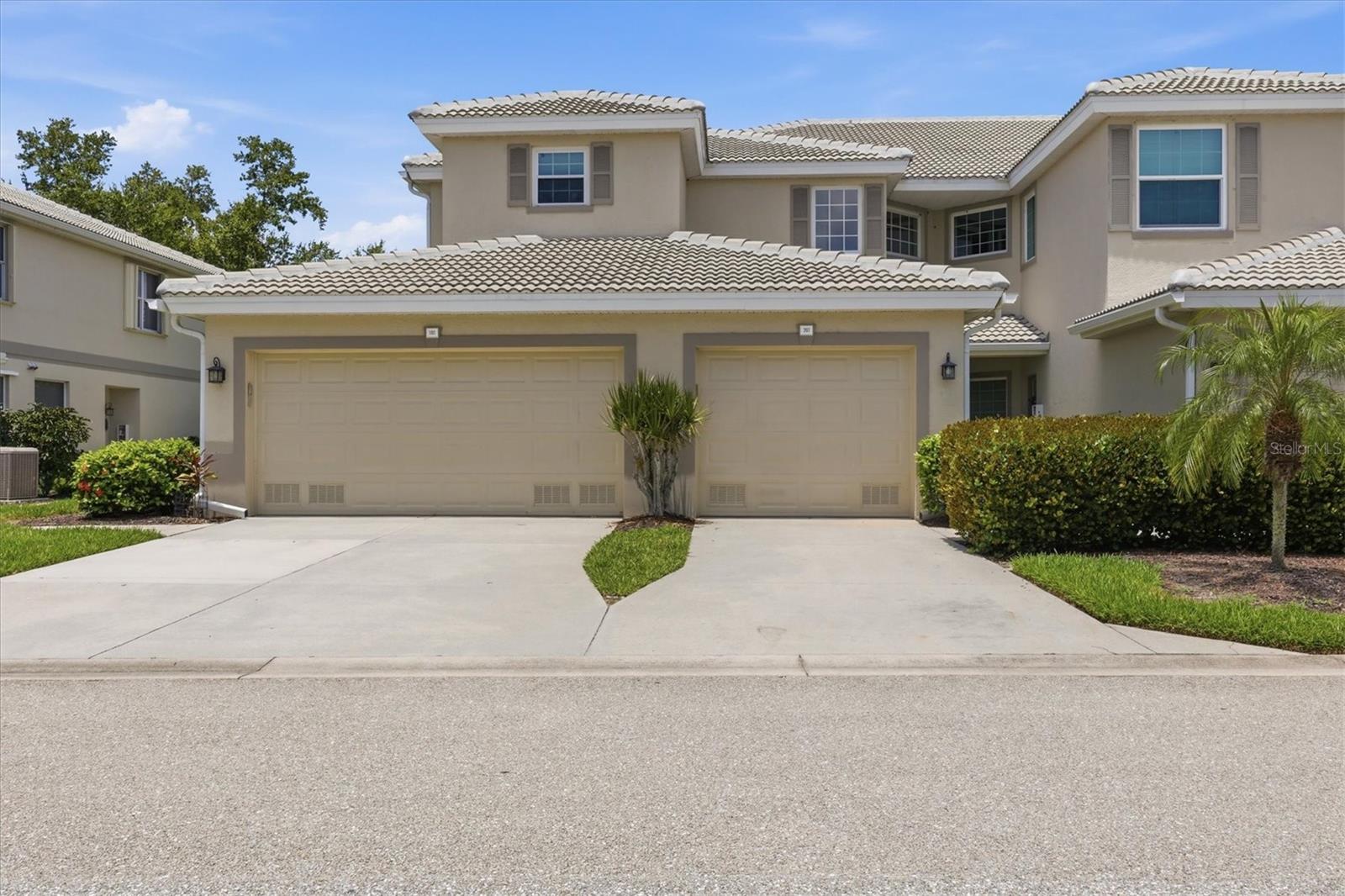 Offered furnished, this beautifully maintained top-floor, three-bedroom, two-bath Grand Vista residence combines an open-concept floor plan and one of the community's most desirable views to deliver exceptional value in Riverwood. The dramatic vaulted ceilings create a living space that feels even larger than its generous square footage. Expansive quad sliding glass doors flood the living area with natural light and open wide to the screened lanai, creating a seamless indoor-outdoor living experience. From this peaceful retreat, enjoy the rare combination of a natural preserve, the 17th tee, and no visible roadways—a uniquely private setting that distinguishes this residence from many comparable properties. Watch native Florida wildlife from your lanai in the morning, then relax in the evening and enjoy spectacular Southwest Florida sunsets. The kitchen opens to the living area, making entertaining easy while maintaining a comfortable sense of connection. It features solid-surface countertops, a striking glass tile backsplash, abundant cabinetry, and a sunny breakfast nook, perfect for casual meals and morning coffee. A separate dining room can easily serve as a cozy sitting room, offering the flexibility so important to today’s lifestyles. The desirable split-bedroom layout provides privacy for owners and guests alike. The spacious primary suite offers a private retreat with a soaking tub, separate walk-in shower, and generous closet space, while two additional bedrooms provide versatility for visiting family and friends. Behind double doors, the third bedroom is currently configured as a home office, offering an ideal workspace while easily converting back to a comfortable guest bedroom. Recent improvements include impact windows, updated plumbing and fixtures, and new ceiling fans, and new roof, providing added comfort and convenience. Grand Vista residence enjoy a private pool with spa, outdoor kitchenette, and screened gathering space. Riverwood is a gated, amenity-rich community offering a championship golf course (membership optional), resort-style pool and spa, fitness center, tennis, pickleball, croquet, bocce, dog parks, walking and biking trails, an active social calendar, and the opportunity to join the private Riverwood Beach Club on Manasota Key. The sought-after top-floor location with attached garage offers the added benefits of no upstairs neighbors, soaring vaulted ceilings and enhanced privacy. Being sold furnished, this move-in-ready home invites you to begin enjoying the Riverwood lifestyle from day one - with the added peace of mind provided by the included homeowner's warranty! Be sure to check out the virtual walk-through in the link above.