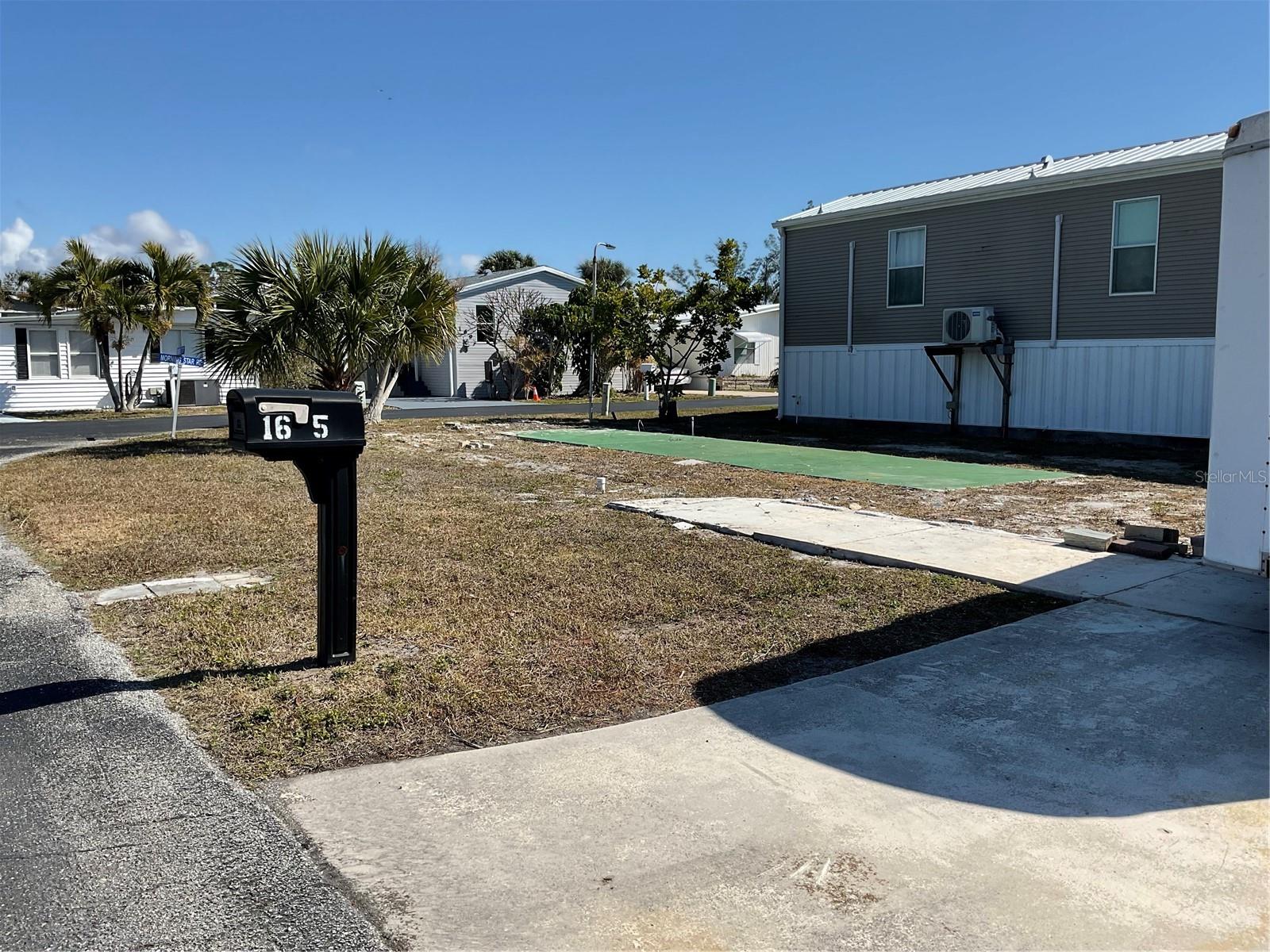 Waterfront Lot- Venice Bay Adult Park 55+community own your own land. Don't miss the rare opportunity to own a prime waterfront lot in a serene community with direct open water access to the Gulf. This lot is 3324 sq ft and features approximately 43 ft with a wooden dock perfect for your dream coastal getaway or mobile home retreat. Enjoy the Florida lifestyle with low maintenance fees of just $475.00 quarterly, which include water, sewer, lawn care and trash removal. Whether you're boating, fishing, or simply relaxing by the water, this lot offers the prefect combination of affordability and location. Enjoy the nearby, public beaches, golf courses, fishing, biking on the Legacy trail, downtown restaurants and cafes, shops and performing arts center.