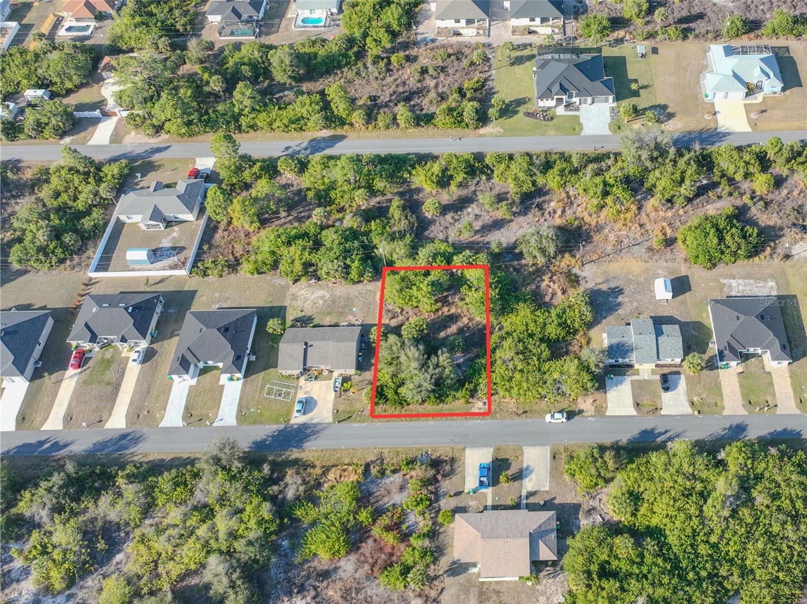 Excellent DUPLEX lot in the growing Port Charlotte market — ideal for investors and builders looking to develop in a high-demand Southwest Florida corridor. CITY WATER AVAILABLE, NO HOA, and SELLER FINANCING AVAILABLE. Conveniently located near shopping, restaurants, golf courses, and everyday amenities, with a short drive to Englewood Beach and its stunning Gulf sunsets. A prime opportunity to build and capitalize on one of Florida's fastest-growing markets.