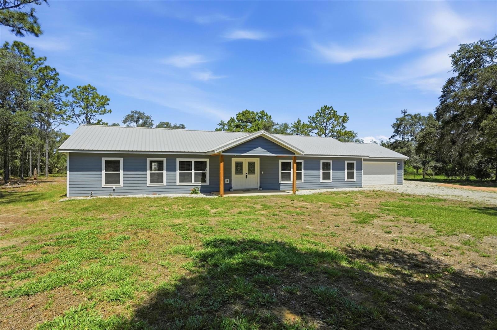 MOTIVATED RELOCATING SELLER WILL CONSIDER ALL REASONABLE WRITTEN OFFERS (NO OWNER FINANCING / NO RENT TO OWN)----Property Appraised for $545,000 in 12/2024-----4.4 BEAUTIFUL ACRES in a PARK-LIKE SETTING!  FANTASTIC MOVE IN READY SITE-BUILT 2024 HOME! Super Location Only Minutes Away from Suncoast Parkway, Shopping, etc, HUGE Light & Bright KITCHEN with OVERSIZED ISLAND and TONS OF CABINETS / LOADS OF STORAGE, Fantastic GRANITE COUNTERS, Remaining Stainless Appliances, Vinyl Plank Flooring Throughout, Vaulted Ceilings, Split Bedroom Plan, LARGE Living Room Area, Office could be 4th bedroom(no closet), Big Primary Bedroom, Double Vanity Primary Bath with Tile Shower, Neutral Tones, Front and Rear Covered Porch Areas, VERY CLEAN / Neat & Ready for a New Owner! Home is Not in a Flood Zone (X).