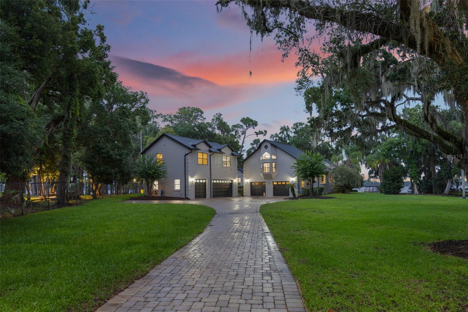 This approximately 4200 square foot home is situated on a 1.68-acre gorgeous lakefront lot in the desirable Winter Park area. The property features a completely updated main house and a detached the three-car air-conditioned garage is a car collector's dream. The primary bedroom suite offers a tranquil retreat, with modern features, ample square footage and completely remodeled en suite bathroom. The remaining two bedrooms with remodeled hall bath provide comfortable accommodations for family and guests. The updated and remodeled interiors showcase a warm, modern, inviting ambiance, with thoughtful design elements throughout. The open floor plan allows for seamless indoor-outdoor living, with access to the lakefront and private boat dock. The lakefront location offers unparalleled privacy and access to the serene waters, creating a serene and peaceful living environment. The property's unique features, including the updated interiors, separate living spaces, and prime lakefront setting, make it an ideal choice for those seeking a distinctive and well-appointed home.

Some of the upgrades include new roof in 2022, New HVAC systems in 2022, new water heater in 2022, new kitchen in 2024, new bathrooms in 2024, new designer light fixtures throughout the house in 2024, upgraded flooring in 2022, new expanded back porch deck in 2022 with stunning views of lake and natural setting, new interior paint in 2024, new exterior paint  in 2022, upgraded mother-in-law, guest house, office space, separated rental or teenager's retreat, new boat lift in 2022, new paver driveway in 2022, new water softener in 2022. No HOA restrictions.
