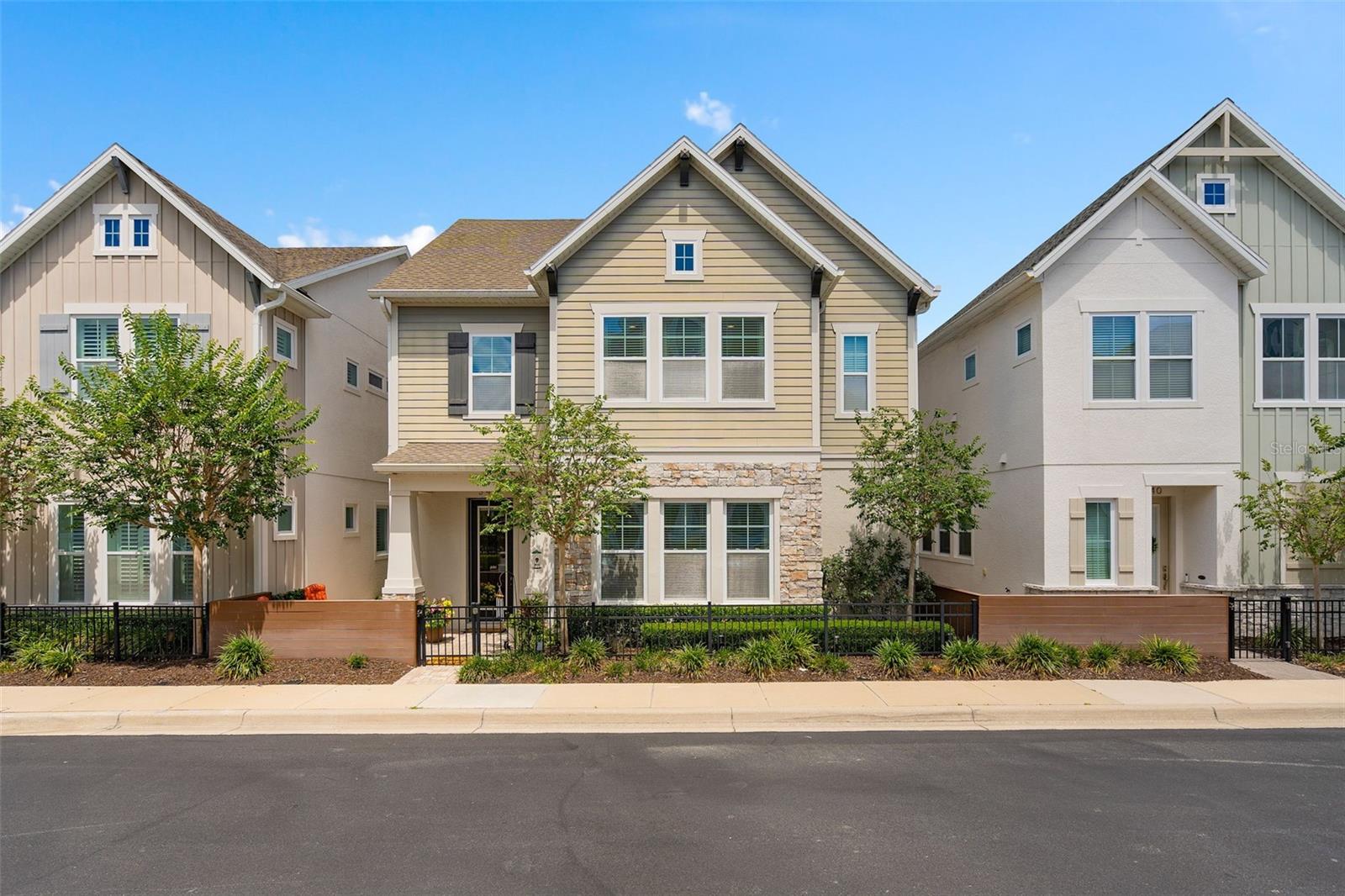 Welcome home to one of Lake Mary’s most desirable gated communities — Griffin Park — where luxury, comfort, and convenience come together to create an exceptional lifestyle. This stunning 4-bedroom, 3.5-bath residence including a Dedicated Office, offers the perfect blend of elegant design and modern functionality, all nestled in the heart of Lake Mary. From  access to shopping, dining, parks, and top-rated schools, this home truly offers something for everyone. Whether you’re entertaining guests, raising a family, or simply enjoying the ease of maintenance-free living, this remarkable property delivers the lifestyle today’s buyers are searching for.
From the moment you arrive, the home’s striking curb appeal, manicured landscaping, and inviting pavered entry create an unforgettable first impression. Inside, soaring high ceilings, abundant natural light, and an expansive open-concept layout showcase the home’s thoughtful design and upscale finishes throughout.
At the center of the home is a truly spectacular gourmet kitchen designed to impress even the most discerning chef. Featuring premium quartz countertops, ceiling-height custom cabinetry, designer backsplash details, stainless steel appliances, natural gas cooking, an oversized center island with farmhouse sink, walk-in pantry, and extensive storage, this space is equally suited for entertaining guests or enjoying quiet evenings at home. The seamless flow into the spacious living and dining areas creates an inviting atmosphere ideal for gatherings of any size.
Upstairs, retreat to the luxurious primary suite — a private oasis complete with a spa-inspired bath, dual vanities, oversized walk-in shower, soaking tub, and an enormous custom walk-in closet designed with exceptional organization and style. Additional guest bedrooms are generously sized and beautifully appointed. A spacious upstairs laundry room adds everyday convenience.
Step outside and enjoy your own private outdoor retreat featuring an oversized screened lanai and expansive paver patio . The perfect setting for relaxing mornings, entertaining friends, or enjoying Florida evenings year-round.
Residents of Griffin Park enjoy a true maintenance-free lifestyle with exceptional community amenities including a resort-style pool with cabanas, dog park, scenic walking paths, fire pit gathering spaces, and beautifully maintained grounds. Ideally located within walking distance to Lake Mary’s top-rated schools, including highly acclaimed “A” Rated Lake Mary High School, this home also offers close proximity to Seminole State College and the Seminole County Biking and Walking Trail System for endless outdoor recreation. Just steps away, you’ll enjoy walkable access to Griffin Farm at Midtown featuring restaurants, boutiques, grocery shopping, coffee shops, and fitness centers. With convenient access to I-4, 417, SunRail, downtown Lake Mary, golf, tennis, and Orlando’s top attractions, including Theme Parks and Beaches. This location truly offers the best of Central Florida living.
Roof, AC , and Tankless Hot Water Heater are all 2018. 
This is more than a home — it’s a lifestyle. Schedule your private showing today and experience luxury living in Griffin Park for yourself.