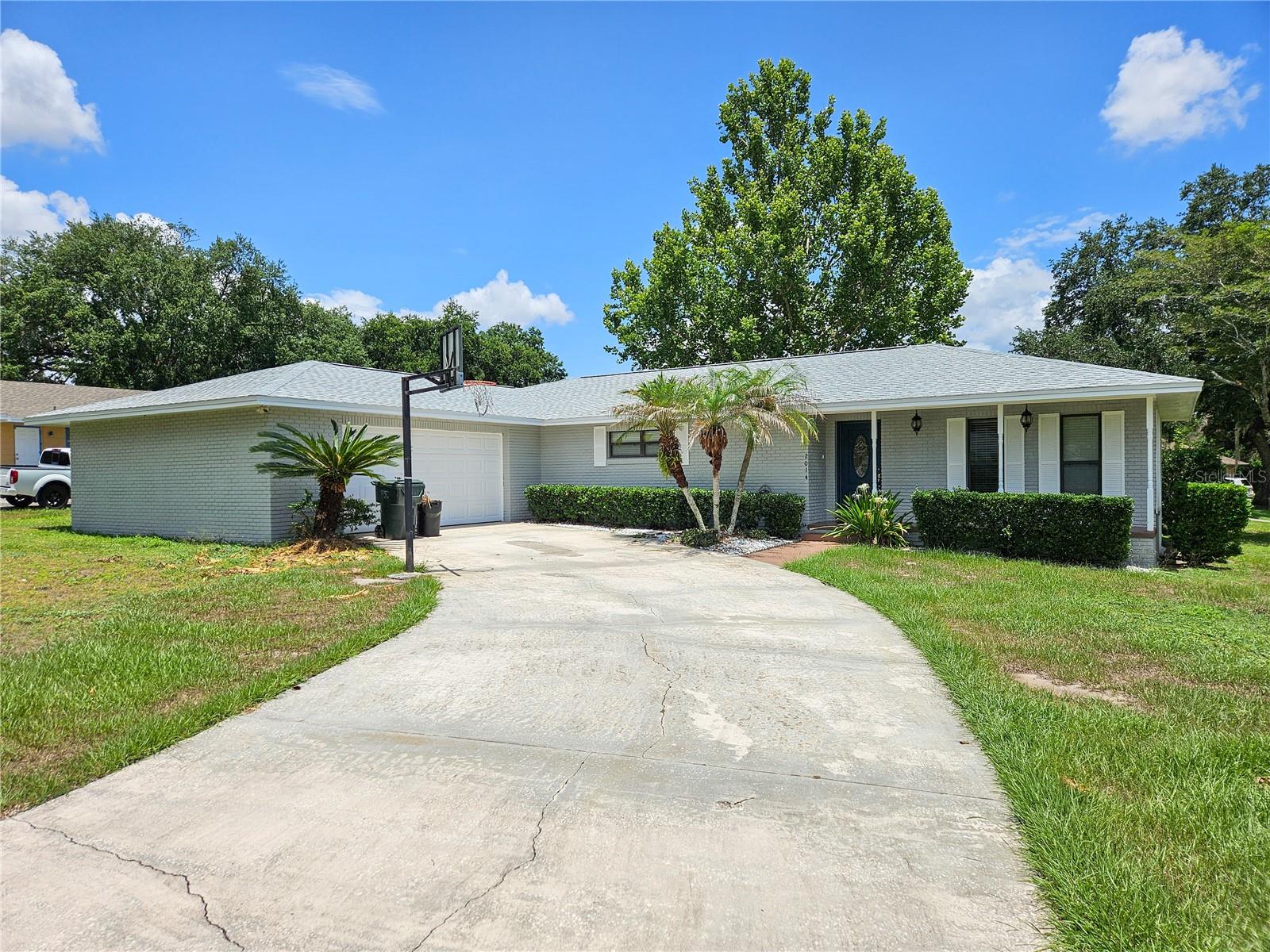 3 bedroom, 2 bath home on large corner lot in South Lakeland! This charming home located in an established neighborhood features an updated kitchen that opens into large family room. Separate formal living and dining rooms in addition to a family room. Master bath has been updated with newer wood cabinets. Sliding glass doors from family room open onto patio space with shrub rows providing privacy. Side of house has fenced play yard. With its expansive yard, great location, classic charm, and updated features this home is must see! Sorry, no pets.