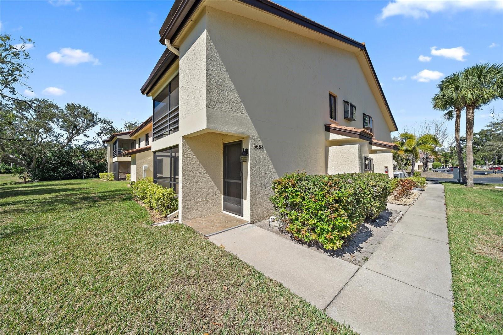Breathtaking Lakefront Condo in Gardens at Palm-Aire. Discover serene Florida living in this beautifully maintained second-floor 2-bedroom, 2-bath condo offering unobstructed lake views from your private screened lanai and both bedrooms—an exceptional feature in the highly desirable Gardens at Palm-Aire. Fully furnished and move-in ready, this light-filled home features an open-concept living and dining area designed for comfort and easy entertaining. A convenient kitchen pass-through enhances flow and functionality, while the spacious primary suite includes a walk-in closet for ample storage. In-unit laundry adds everyday convenience. Major system updates provide peace of mind, including a new A/C system (9/24/23) and water heater (10/25). This well-maintained residence allows for true maintenance-free living. Enjoy resort-style community amenities including a heated pool, clubhouse, tennis and shuffleboard courts, sauna, game room, and barbecue area. Ideally located just minutes from I-75 and close to University Town Center, downtown Sarasota, St. Armands Circle, and the Gulf’s world-famous beaches—including Siesta Key, Lido Key, and Longboat Key—this lakefront opportunity blends tranquility with convenience. Now newly priced for improved value, this turnkey lakefront condo offers one of the best opportunities in one of Sarasota’s most established and convenient communities.