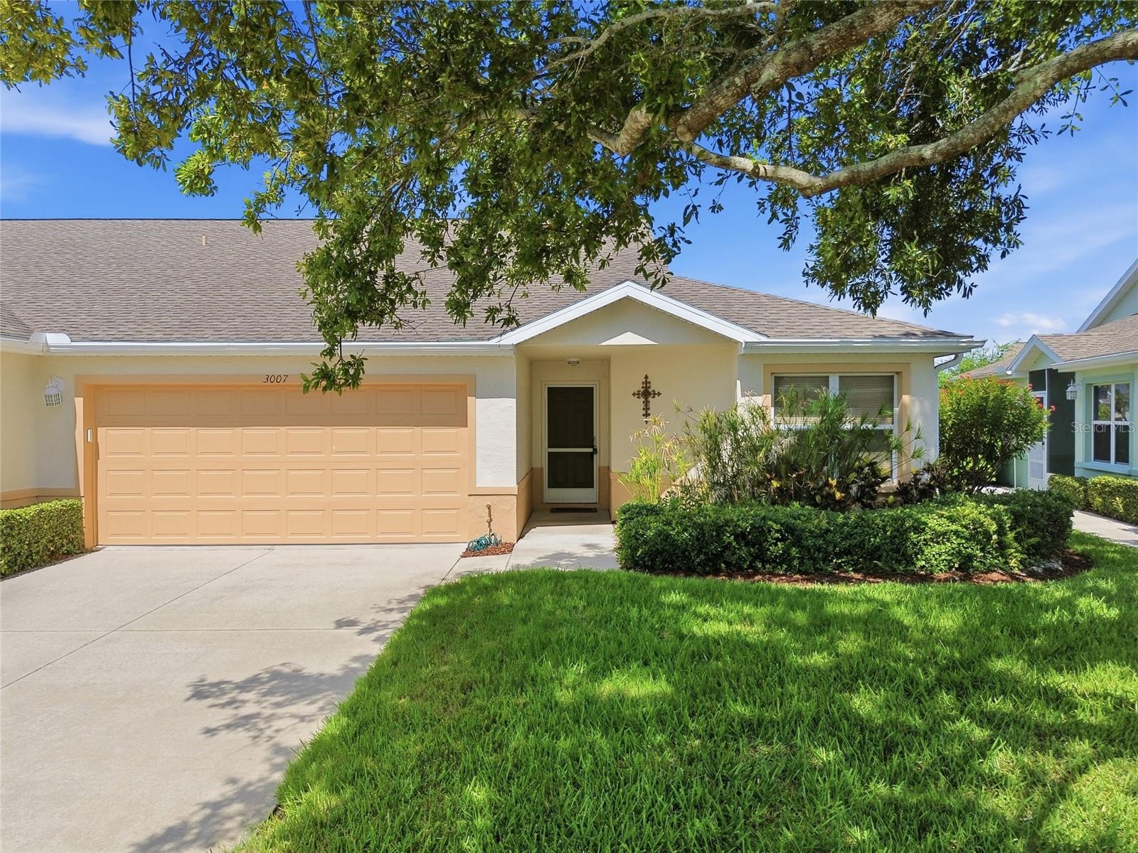 Opportunity awaits - Priced to Sell  Nicely updated, this move-in-ready 2BR/2BA villa in Bay Estates North offers exceptional value and carefree Florida living. Freshly painted throughout in 2025—from the ceilings to the trim—the interior feels bright, clean, and inviting. Recent updates include a new A/C system (2024), brand-new carpeting (2025), and a newer washer and dryer (2023), providing comfort and peace of mind from day one.  The well designed split-bedroom floor plan offers privacy for owners and guests, while vaulted ceilings and the open living and dining areas create a spacious, welcoming atmosphere. The kitchen flows effortlessly into the main living space and features a convenient breakfast bar, making it ideal for everyday living and entertaining. A welcoming foyer provides an attractive first impression upon entry.  The enclosed porch extends your living space and offers the perfect spot to relax and enjoy Florida's beautiful weather throughout the year. A rare two-car garage provides generous storage and everyday convenience.  Ownership includes cable, internet, lawn care, and exterior maintenance, allowing you to enjoy a truly low-maintenance lifestyle. Located within Terra Ceia Bay Club in Palmetto, Bay Estates North residents have optional access to golf, dining, a resort-style pool, pickleball, and tennis. Just a short drive to the vibrant waterfront of St. Petersburg and the beautiful beaches of Anna Maria Island, this villa offers the perfect combination of location, lifestyle, and outstanding value.
