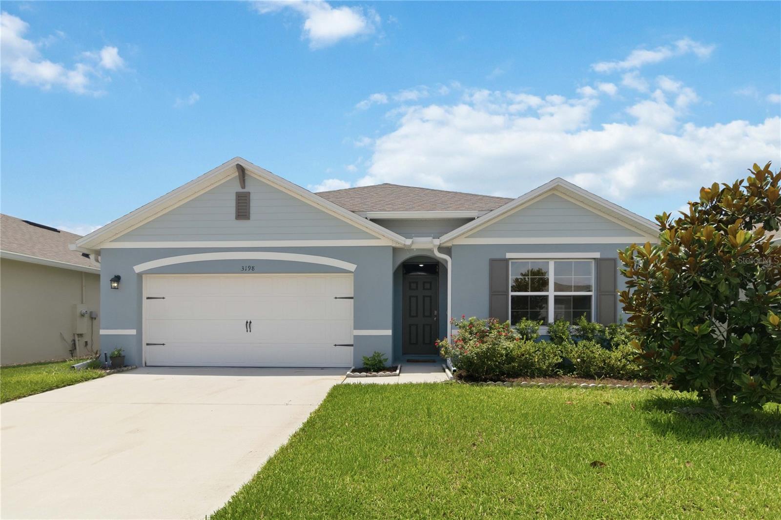 Must-See Home in a Gated Community! Nestled in a charming, hidden gem of a neighborhood just minutes from Historic Downtown Sanford, this exceptional home offers the perfect blend of comfort, convenience, and community living. Residents enjoy outstanding amenities, including a resort-style community pool surrounded by upgraded pavers, a tranquil walking path encircling a picturesque pond, a fenced dog park, and a spacious green park area with benches—perfect for outdoor games, family fun, and relaxing afternoons.

Located just minutes from the heart of Historic Downtown Sanford, you'll have easy access to one of Central Florida’s most charming waterfront destinations. Explore brick-lined streets, unique boutiques, local restaurants, craft breweries, year-round events, the scenic RiverWalk, and the beautiful shores of Lake Monroe.

Step inside the award-winning Cali floor plan featuring 4 bedrooms, 2 bathrooms, and smart home technology throughout. This thoughtfully designed home includes Z-Wave technology with a smart thermostat, front door lock, porch light controls, touchscreen control hub, and Amazon Dot. The open-concept layout offers a spacious living area that flows seamlessly into the kitchen and dining space, making it ideal for entertaining. A formal entryway provides privacy between the guest bedrooms and the owner's suite, while a centrally located flex space is perfect for a home office, study, or hobby room.

The kitchen and bathrooms showcase upgraded granite countertops, and all appliances are included. Additional upgrades include a premium Leaf water softener system with reverse osmosis water filtration and an expanded rear brick-paver patio (42' X 18'), creating the perfect outdoor living space for gatherings, celebrations, and everyday enjoyment.

The oversized primary suite is truly impressive, featuring a luxurious ensuite bath with a private water closet and an enormous walk-in closet that feels like an additional room. Enjoy peace of mind and lower utility costs with energy-efficient features including a 15 SEER HVAC system, dual-pane Low-E windows, and durable block-on-block construction.

Relax on the covered lanai, enjoy the incredible community amenities, and experience everything this wonderful Sanford location has to offer. This home checks all the boxes and is ready to impress from the moment you walk through the door. Schedule your showing today—this one won't last long!