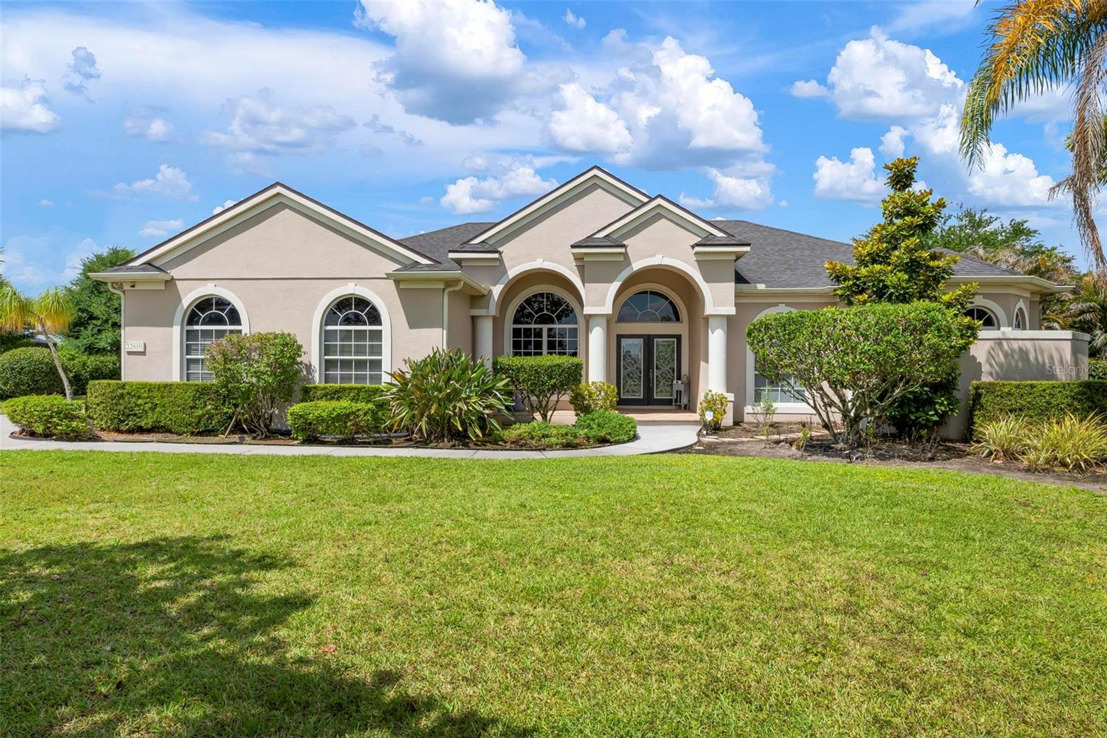 Set within the expansive and sought-after Panther Ridge community, spanning over 4,500 acres just moments from Lakewood Ranch, The Preserve offers a rare blend of privacy and natural beauty. With each homesite sitting on at least one acre and surrounded by dedicated conservation land, parks, and scenic trails, this neighborhood is designed for those who appreciate space and tranquility. Positioned on 1.14 beautifully maintained acres and backing to a serene wooded preserve, this custom-built estate delivers both elegance and comfort. Featuring 4 bedrooms, 2.5 bathrooms, and a versatile bonus room, the home has been meticulously cared for and thoughtfully designed to highlight indoor-outdoor living. From the moment you arrive, the curb appeal stands out. Inside, you’ll find a split bedroom floor plan for privacy, high ceilings, a seamless open layout, and a combination of tile and wood flooring throughout, with no carpet in sight. The living spaces are centered around the stunning outdoor retreat, with disappearing sliding glass doors doors that create a true extension of the home. The kitchen is both functional and stylish, complete with upgraded wood cabinetry, granite countertops, a spacious island, and a walk-in pantry. The owner’s suite is a private escape, offering direct access to the pool area, generous walk-in closets, and a beautifully appointed bathroom designed to impress. Step outside and experience a resort-style setting. The heated saltwater pool / spa, enhanced with jets and a tranquil water feature (controlled by your phone), are surrounded by an expansive paver deck ideal for relaxing or entertaining. An outdoor summer kitchen completes the space, making it perfect for hosting gatherings year-round. The backyard is fully fenced and thoughtfully landscaped with lush tropical greenery, creating a PRIVATE  oasis that feels worlds away. Every detail of this property reflects quality and care, offering a lifestyle that is both peaceful and refined. Significant recent upgrades add even more value and peace of mind, including a new roof (2022), new AC system (2021), new water heater (2025), a Culligan water system (2024), and a washer and dryer installed in 2024. Schedule your private showing and experience it for yourself before it’s gone.