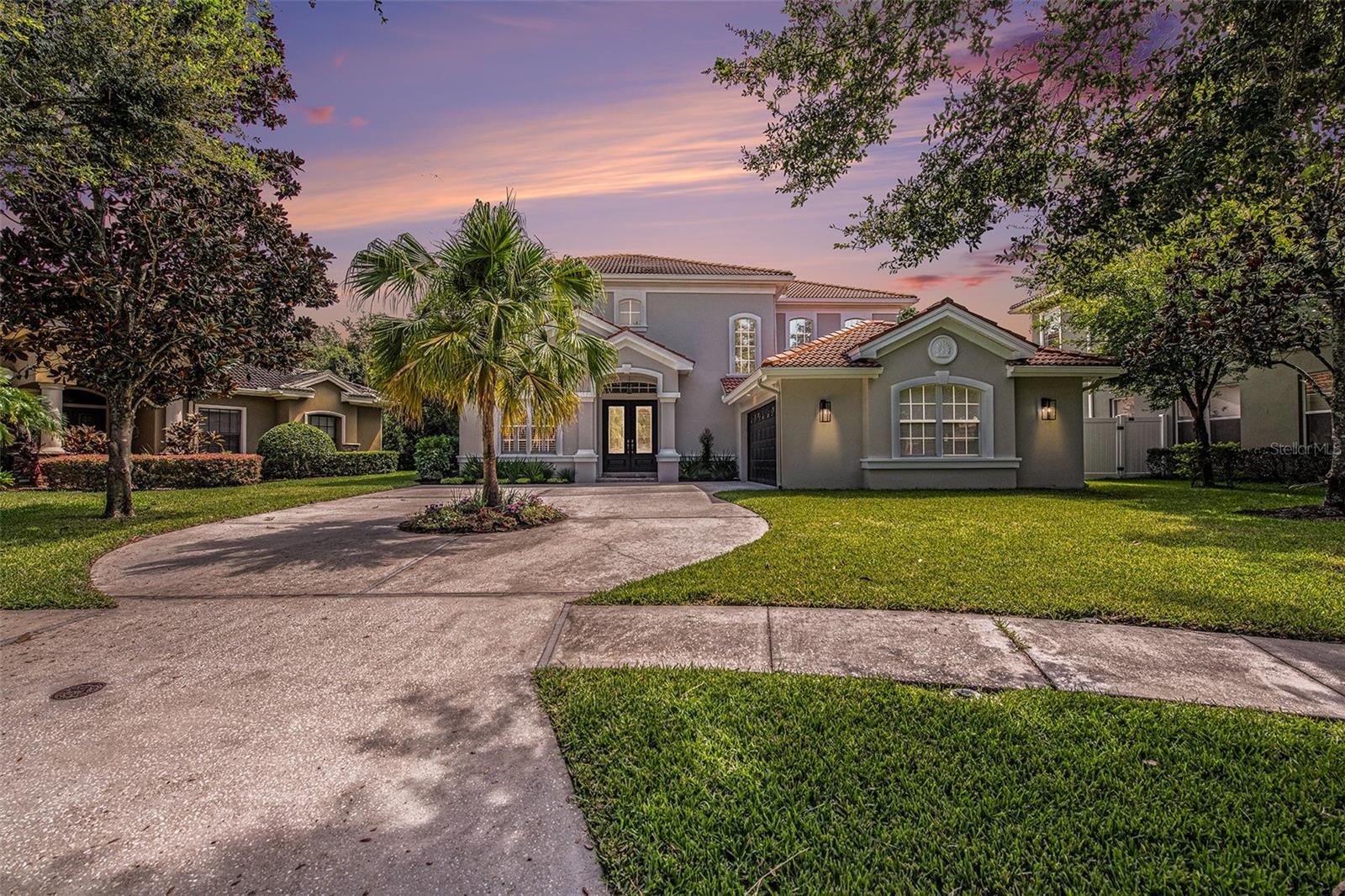 Welcome to 13807 Springer Lane, an exquisite gem nestled within The Reserve at Woodmont, an exclusive community in the Citrus Park area boasting just 22 homes. This gorgeous residence, crafted by renowned builder Marc Marconi, has been thoughtfully updated for the modern homeowner. Step inside and discover the ultimate in security with a top-tier system featuring new cameras and panels, along with the convenience of a brand new Ring doorbell. The exterior has been meticulously enhanced with fresh pavers, pool decking, and pristine landscaping, all framed by a recently painted stucco finish. As you explore the interior, you'll be captivated by the seamless flow of this home, where every detail has been considered. New baseboards, lighting fixtures, switches, and cabinet knobs, ceramic tile, luxury vinyl plank, and custom tile work lend an air of modern elegance throughout. The kitchen is an entertainers dream, boasting brand new top of the line granite countertops and a sleek, contemporary faucet. After your party, clean up is a breeze with a brand new dishwasher at your disposal. Luxury awaits in the master bathroom, where new quartz countertops, a custom mirror, and fresh floor tiles create a spa-like retreat. Step into the brand new shower with a glass surround, and you'll be in heaven. Upstairs, is an open loft: the perfect game room and hangout spot. Don't worry, the fresh paint and luxury vinyl plank flooring will add a touch of sophistication to the space. With four bedrooms, this home offers ample space for you to grow and host. Don't worry- the garage has not been forgotten! With new springs and controls ensuring smooth functionality. Through 8' sliding glass doors you will find a tropical retreat, right in your back yard. The extended covered lanai features an outdoor kitchen space that overlooks a caged pool with privacy of a hedgerow behind the property. Beyond the walls of this remarkable residence, you'll discover a world of convenience. Located mere minutes from the Veterans Expressway, Tampa International Airport, Citrus Park Mall, A-rated schools, award-winning beaches, and Tampa's epic sports teams and entertainment venues, you'll have everything you need within reach. Don't miss your chance to make this pristine home in The Reserve at Woodmont your very own. Contact us today to schedule a private tour and experience luxury living at its finest.