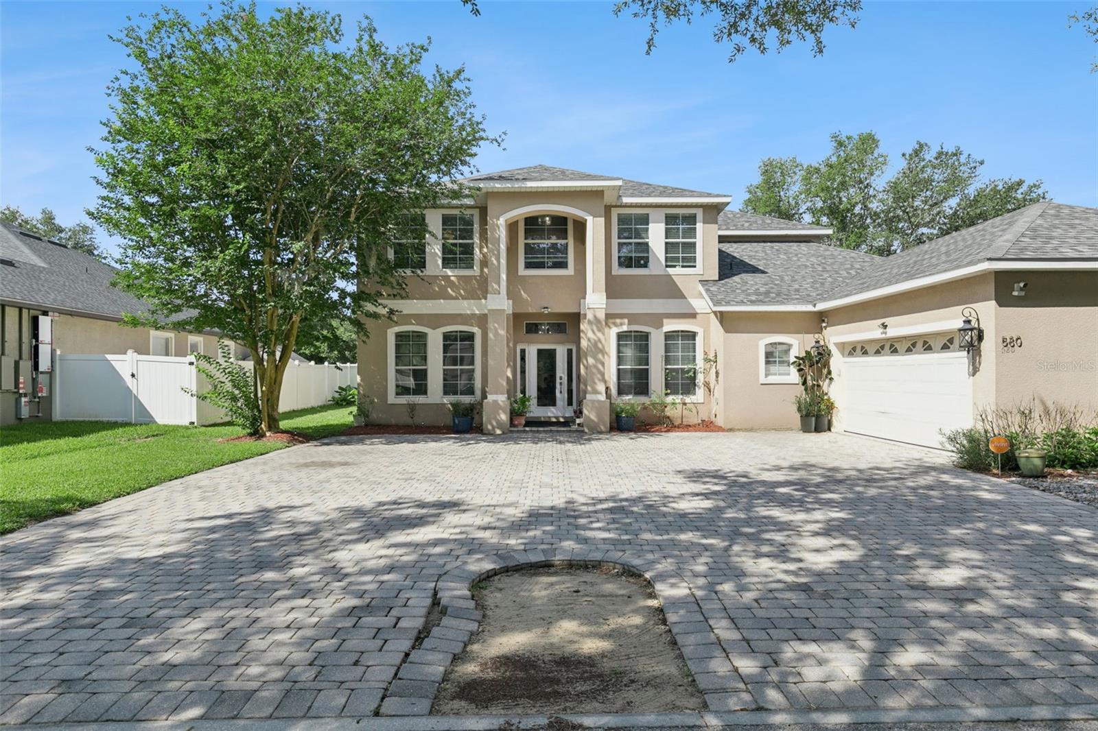 Lovely 5-bedroom 3-bathroom POOL HOME sits on a beautiful tree-lined street with a
paver courtyard enhancing the entrance to this grand home. An inviting entrance with a transom window and side lighting windows for tons of natural light. Crown molding, ceiling fans, built-ins, arched doorways, unique lighting, stainless steel appliances.  The home has the space to accommodate your family life as well as
entertaining friends. Your grand foyer leads to the living room with a formal dining room on the opposite side. The Great Room has space for
your family to relax and entertain! Here you will find Patio doors, leading to a beautiful screened-in pool and spa which overlooks a conservation
area. The pool has a jacuzzi, pool includes color changing lights with a remote control. With a guest bathroom located near the patio, you have easy outdoor access. The kitchen has a large breakfast bar, plenty of cabinets and a
comfortable dinette. Walk-in Pantry. The oversized Laundry room is conveniently located next to the kitchen. On one side of the first floor, you will find the expansive
Owner’s Suite with a walk-in closet, an ensuite bathroom with a large walk-in shower, and a separate spa tub. Across the Great room is a bedroom and a full bathroom, perfect
for guests. Upstairs, you will find 3 large bedrooms, a full bath, and an oversized loft/family room. New Roof in August 2025. 
The community is close to shopping and restaurants. It is minutes to Kelly Park, Rock Springs Park and Wekiva Springs Park where you can enjoy hiking; picnicking; wildlife; and tubing, swimming and canoeing in the clear, natural springs.  Nearby Northwest Recreation Complex features athletic fields, tennis courts, basketball courts, an amphitheater, walking paths and playgrounds. Apopka is a small drive to I-4, downtown Orlando, and the 429 Expressway to take you to the Central Florida theme parks: Disney, Universal Studios and SeaWor
