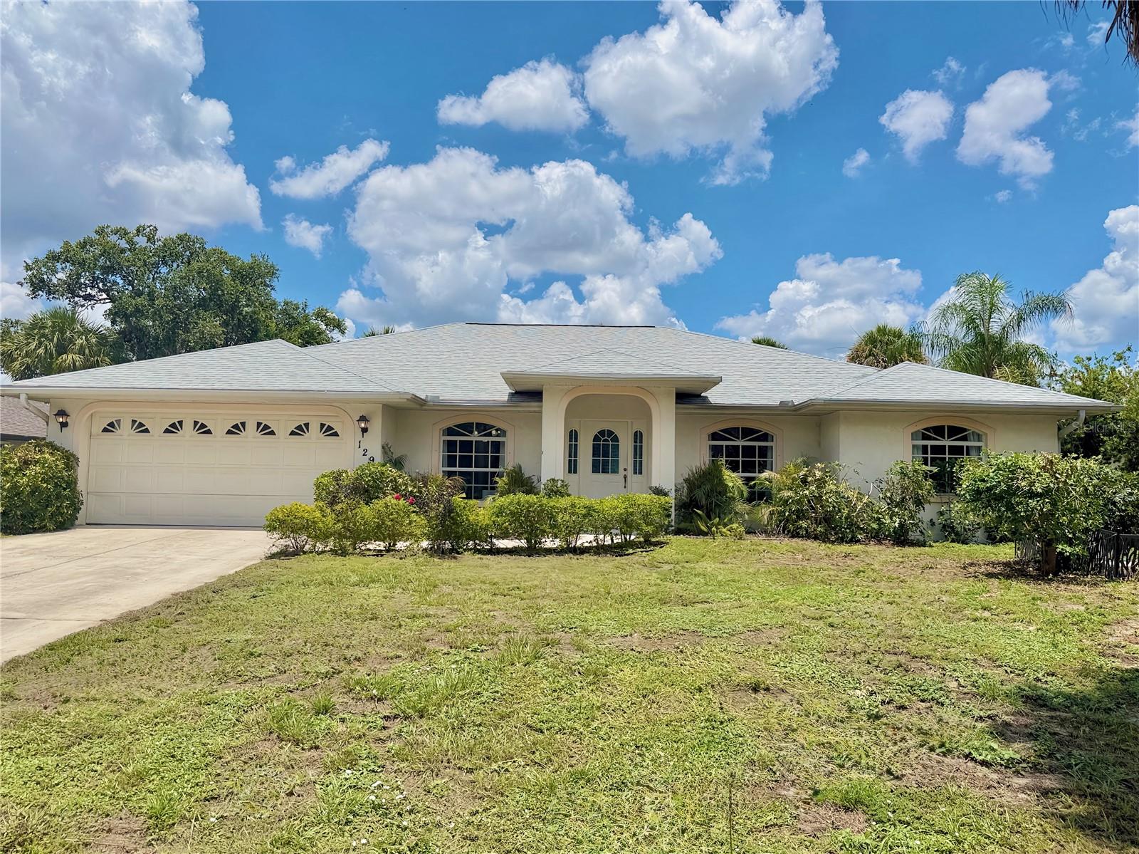 Welcome to the Florida waterfront living at its finest. This canal-front heated salt water pool home features 3-bedroom, 2-bath, and 2 generous size dens/flex areas. Located on the canal frontage just off the Jupiter Waterway, it offers boaters an easy cruise access to the Myakka River which takes you out to the Gulf; yet excluded from the flood zone, bringing peace of mind. Inside, a bright and airy open-concept layout connects the living, dining, and kitchen areas, highlighted by modern vinyl flooring. Other highlights include SS appliances in the kitchen, dedicated pantry, a separate laundry room complete with washer and dryer. Split floor plan ensures privacy and comfort, with master bedroom on one side and en suite bathroom with double sink, both bathtub and walk-in shower, and a walking closet. The glass sliders create a seamless indoor-outdoor flow to the fully screened lanai, where your private backyard oasis awaits. Enjoy the serenity of the lush garden, surrounded by vinyl fence, newer pavers around the house leading all the way to the recently replaced composite dock, fire pit and the seating area with breathtaking views of the canal. Roof, A/C and water heater replaced in 2021. Located close to the border of North Port, you're less than a mile from the shopping plaza, with many fabulous stores and restaurant options in the area, while being a short drive to amazing white sandy beaches on Boca Grande and Manasota Key! 
Come LIVE YOUR FLORIDA DREAM, this wonderful home has it ALL! Don’t wait, book your private showing today!