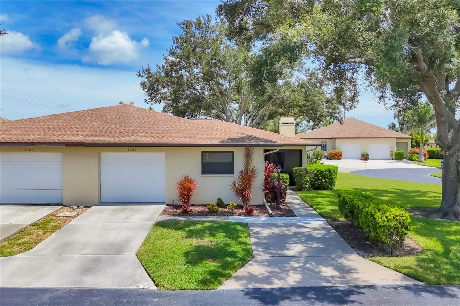 **Seller is offering to pay 1 yr of HOA at closing**
Just off the beaten path is this Charming Corner Villa with Modern Upgrades & Prime Location!
This quaint little community is full of happiness and charm.  Don't miss this beautifully updated 2-bedroom, 2-bath end-unit villa featuring a split floor plan and a wealth of desirable features! Located on a spacious corner lot, this home includes a screened front porch, a versatile Den/Office, The den/office has a door that opens to a side yard with a small concrete pad,  perfect for relaxing or entertaining.  Step inside to discover gorgeous porcelain tile flooring throughout, a remodeled kitchen and bathrooms, and double-pane IMPACT windows for energy efficiency and peace of mind. Additional upgrades include a water softener, water purifier and filtration system, and energy-efficient toilets.  You'll love the newer appliances and washer/dryer (installed 6/2023), and the brand new water heater (6/2024). The AC was replaced in 8/2021, and new gutters were added in 2024. The roomy 1-car garage also features an additional private parking space.   This well-maintained community offers a low-maintenance lifestyle with HOA fees that cover the roof, pool, cable/internet, garbage/recycling, lawn care, and pest control.   Unwind in Style at the Heart of the Community.  Dive into relaxation at the sparkling community pool—where crystal-blue waters offer the perfect escape from Florida’s sunny, steamy days. Fire up the grill for a laid-back cookout with family and friends, or simply kick back and enjoy the serene atmosphere.  In this charming neighborhood, making new friends comes naturally, and fun is never far away. Whether you're sharing laughs poolside, joining community events, or exploring the nearby attractions, there's always something to discover. From outdoor adventures to cozy moments close to home, every day feels like a vacation here.
Conveniently located with easy access to shopping, dining, healthcare, and major roads—everything you need is just minutes away!
This move-in ready villa has it all—comfort, convenience, and style. Schedule your private showing today!