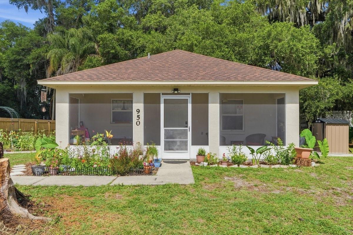 Move right into this beautifully updated 2-bedroom, 1-bath concrete block home situated on a spacious corner lot with NO HOA! Offering a perfect combination of modern upgrades, energy efficiency, and Florida living, this property is ideal for first-time home buyers, retirees, investors, or anyone seeking a low-maintenance home with major improvements already completed.

Enjoy peace of mind with a BRAND NEW ROOF (2025), NEW AC (2025), NEW WATER HEATER (2025), freshly cleaned air ducts, and a home that has NEVER FLOODED. The exterior has been completely re-stuccoed and freshly painted, creating excellent curb appeal and long-lasting durability.

Relax and enjoy Florida's beautiful weather from the screened-in front porch, the perfect spot for morning coffee, evening relaxation, or welcoming guests.

Inside, you'll find bright, energy-efficient living spaces filled with natural light, enhanced by resurfaced walls and ceilings, fresh interior paint, and beautiful tile flooring throughout. The updated kitchen features a new refrigerator, newer oven, and newer exhaust hood, while the renovated bathroom offers stylish updates and modern finishes. The convenient inside laundry room adds everyday functionality.

Step outside to enjoy the fully fenced yard with established garden beds already in place, providing the perfect space for gardening, pets, outdoor entertaining, or simply relaxing. The large corner lot offers additional privacy and room to store a boat, RV, or recreational equipment, create a backyard oasis, or expand outdoor living spaces.

Conveniently located near shopping, dining, schools, parks, medical facilities, and Florida's beautiful beaches, this move-in-ready home offers the updates buyers are searching for without the burden of HOA fees. With major systems replaced, modern improvements throughout, abundant natural light, energy-efficient features, and exceptional value, this home is ready for its next owner. Schedule your private showing today!