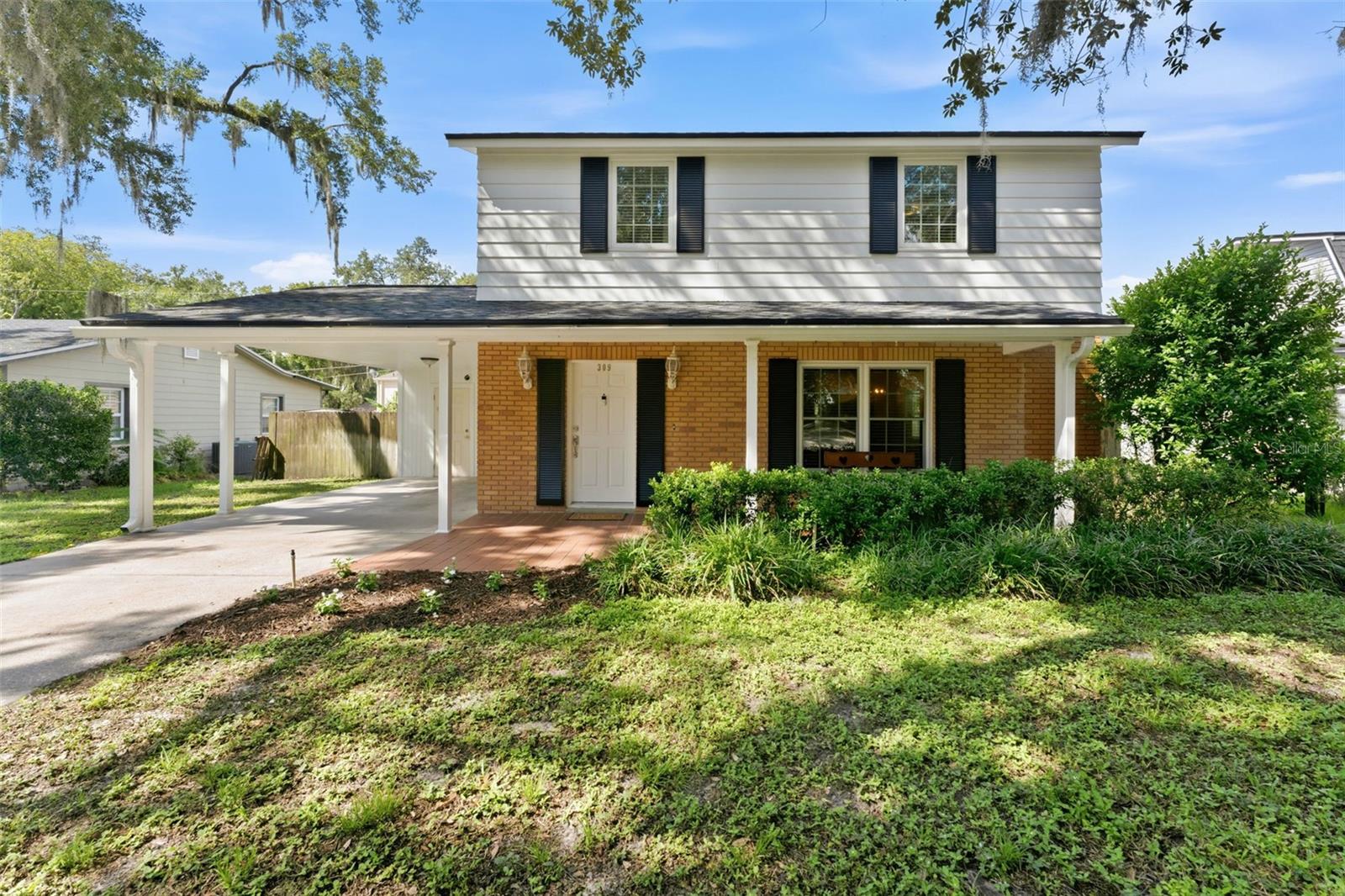 Set on a tree-lined street in beautiful Temple Terrace, with a front porch made for slow evenings, this home pairs vintage character with practical updates — plumbing redone in April 2026, HVAC from 2020, no flood zone, and a clear 4-point inspection.
Inside it is arranged the way homes used to be: a spacious living room with large picture windows pouring in natural light, wood flooring throughout the living spaces, and warm wood kitchen cabinets. A first-floor bonus room flexes as an office, den, or playroom.
Storage is where this home quietly outperforms: a large walk-through pantry, foyer coat closet, generous upstairs linen closet, built-in shelving, and a walk-in closet in the primary bedroom. A central vacuum system makes upkeep easier, and the air-conditioned workshop also has extra space available for storage. The fenced-in spacious backyard with a playset and paved porch makes the ideal space for outdoor Florida living.
Temple Terrace delivers the setting to match — established, tree-canopied streets with hometown character and the fun is built right in with multiple family parks throughout the community. The Temple Terrace Family Recreation Complex has memberships to unlock multiple pools, basketball, tennis, pickleball, and programs for every age — plus new homeowners are eligible to receive a complimentary three-month social membership to the Temple Terrace Golf and Country Club.  Minutes from I-75 and Highway 301, shopping & dining. 10 Minutes from University of South Florida, Moffitt Cancer Center & AdventHealth Hospital, 20 Minutes from Downtown Tampa, 25 minutes to Tampa International Airport, 30 Minutes to MacDill AFB and 45 Minutes to Gulf Beaches