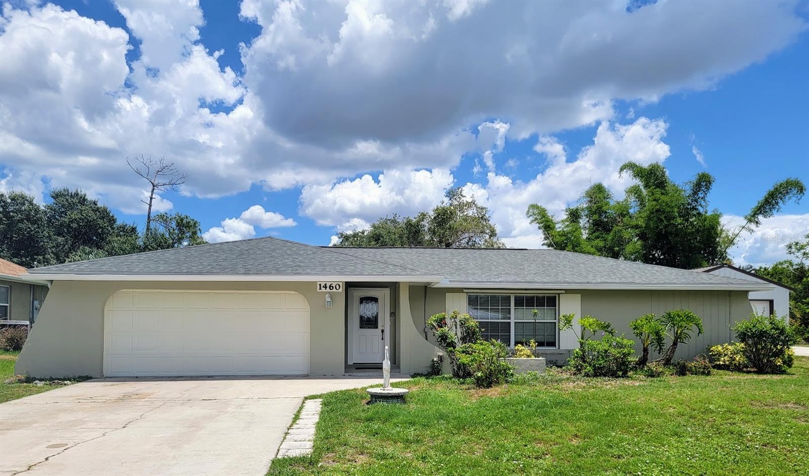 Stunning, Fully Updated Residence with Expansive Outdoor Living.
Discover your perfect home in this beautifully renovated 3-bedroom, 2-bathroom residence. Meticulously updated from top to bottom, this home offers a clean, contemporary aesthetic and is ready for immediate occupancy. With 1,648 sq. ft. of well-designed interior living space and an exceptional 640 sq. ft. screened-in lanai, this property seamlessly blends modern indoor comfort with generous outdoor relaxation.

Interior Highlights:

Renovated Kitchen: The heart of the home features high-quality solid wood cabinetry and premium stone countertops, perfect for daily living and entertaining.

Open & Functional Layout: A spacious split floor plan ensures maximum privacy for the primary suite, complemented by bright, airy living areas.

Quality Finishes: Enjoy a seamless flow throughout the home with a tasteful combination of durable, high-end tile and flooring.

Exterior & Practicality:

Impressive Lanai: The crown jewel of the outdoor space is the massive 640 sq. ft. screened-in lanai. This expansive, bug-free area serves as a true extension of the home, ideal for year-round entertaining, dining, or simply relaxing in the fresh air.

Recent Capital Improvements: Peace of mind comes standard with a roof replaced in 2022. The exterior also features a reliable hurricane shutter system and functional rain gutters.

Bonus Storage: The property includes two exterior storage sheds, with one fully equipped with electricity—an ideal setup for a workshop, hobby room, or additional storage.

Generous Lot: Situated on a large, level, and well-manicured 80' x 125' lot, the home offers excellent curb appeal and ample space.

Location & Convenience:
Ideally positioned in a quiet, established Port Charlotte neighborhood, you are just minutes away from essential shopping, dining, and professional services. Enjoy the comfort of a peaceful residential setting with convenient access to local parks, schools, and major transportation routes.

Key Features:

Bedrooms/Baths: 3 BR / 2 BA

Garage: Attached 2-car garage

Lanai: 640 sq. ft. screened enclosure

HOA: None

Status: Offered vacant and move-in ready

This is a rare opportunity to own a completely refreshed home with an unparalleled outdoor living space. Schedule your private showing today to appreciate the quality of the updates and the impressive scale of the lanai firsthand!
