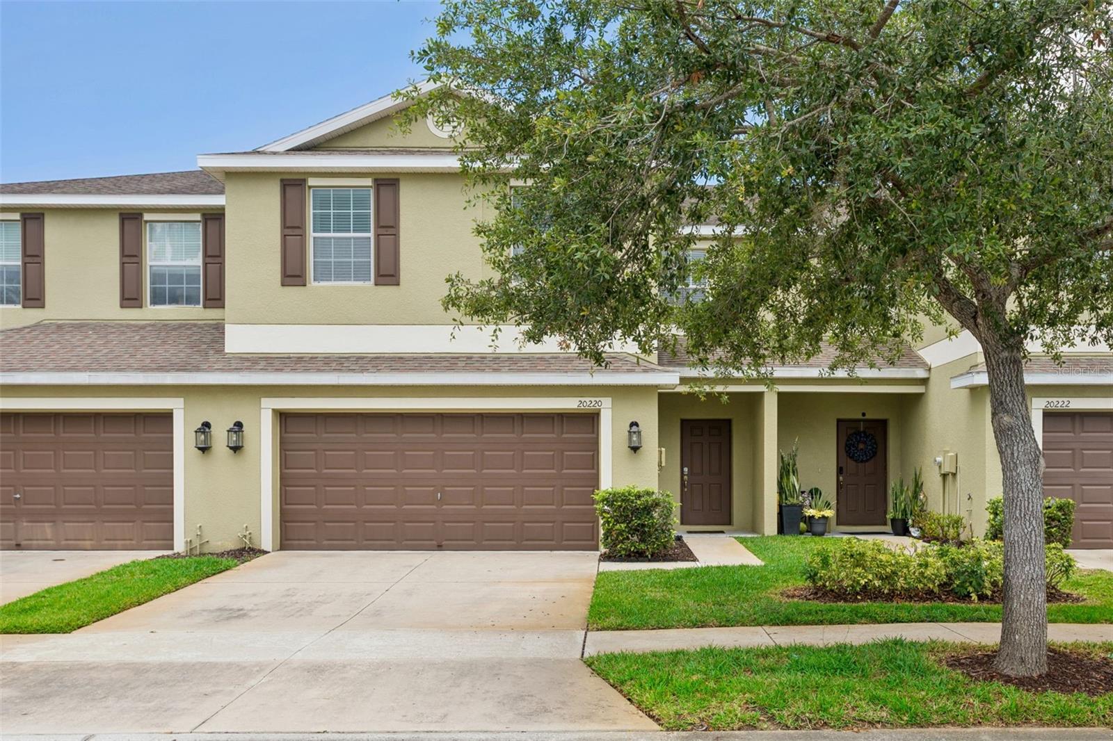 Nicely maintained 3bd/2.5 bath Townhome with Loft in the gated Community of The Hammocks. Located in New Tampa. Features a spacious main floor with half bath. Large pantry in Kitchen area. Kitchen consists of Granit countertops and tiled backsplash, Stainless steel appliances with tiled flooring and bar height counter which helps make the kitchen nice and functional.  One of the larger Screen patios in the development is off the dining area. The 2nd Floor has 3 bedrooms with 2 bathrooms. The Generous Primary bedroom has a large walk-in closet, and the en-suite bath has double sinks and walk in shower with separate tub.  Laundry room is located upstairs near the bedrooms for easy access. Loft at the top of the stairs is spacious and can be used as a Den or 2nd family room. The home also comes with an attach two-car garage. The HVAC is 3yrs old and the washer and dryer is 6mo old. 
 Conveniently located just minutes from schools, shopping, dining, Wiregrass Mall, and Tampa Premium Outlets next to Costco with easy access to I-75, I-4, and I-275. Schedule your showing today!
