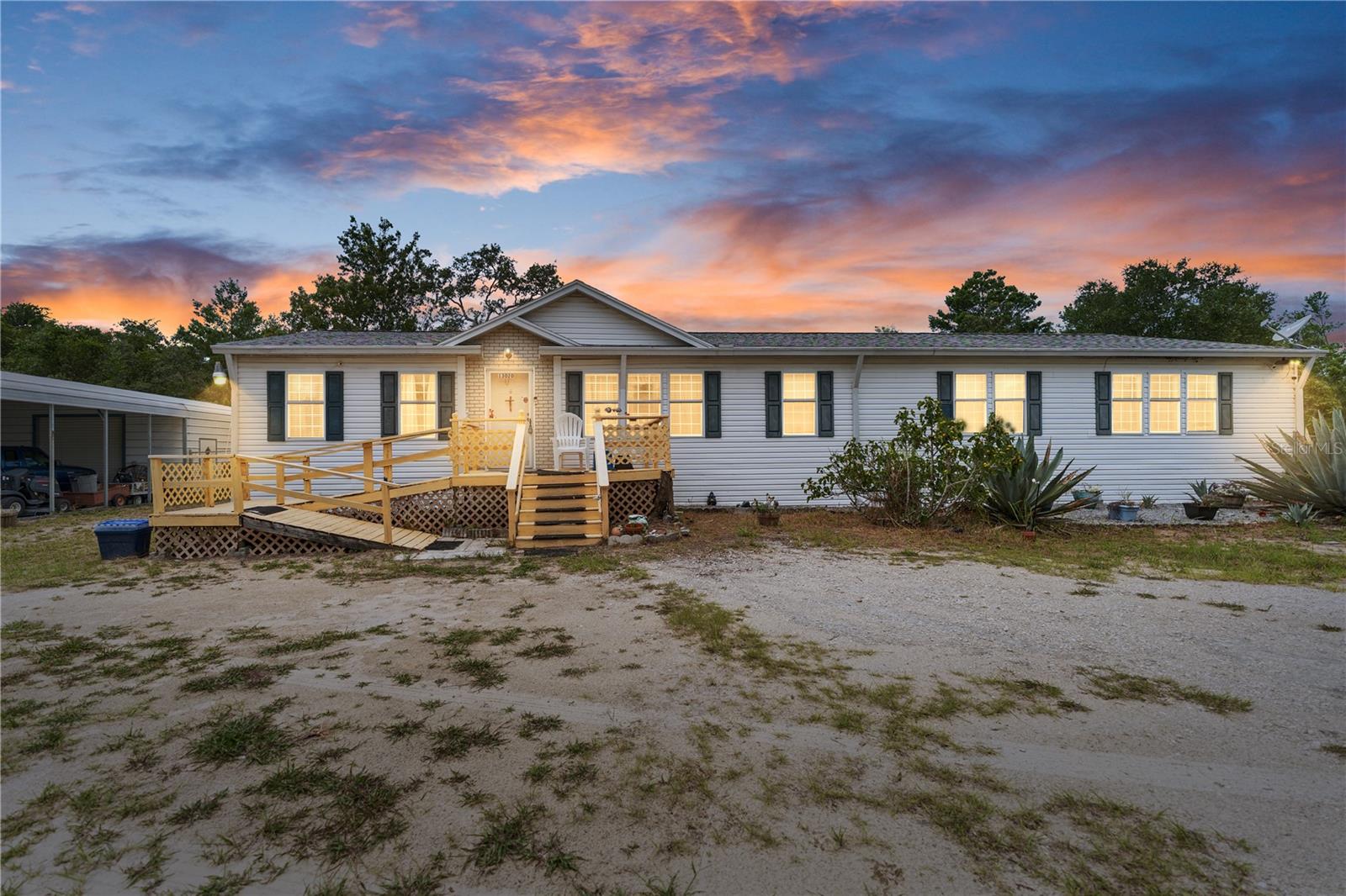 Experience the perfect balance of privacy, space, and convenience with this exceptional 4-bedroom, 2-bathroom home situated on 2.5 picturesque acres in one of Brooksville's most desirable locations. Tucked away on a secluded flag lot and perched atop a hill, this property offers a peaceful setting with exceptional privacy, creating your own private retreat while remaining just minutes from everything you need. A brand-new roof installed in 2024 provides added peace of mind, while the expansive property offers endless possibilities for hobbyists, animal lovers, or anyone seeking room to spread out. Outside, you'll find a large detached 2-car garage with an attached 2-car carport, three pigeon coops, a storage shed, and a fenced rear yard—providing ample space for vehicles, equipment, recreational toys, pets, or outdoor entertaining. Perfectly positioned just 5 minutes from the Suncoast Parkway, you'll enjoy an easy commute to Tampa while coming home to the serenity of country living. Nature lovers will appreciate being only 5 minutes from the world-famous Weeki Wachee Springs State Park, where crystal-clear spring waters, kayaking, paddleboarding, swimming, and the iconic live mermaid shows offer year-round recreation. Everyday conveniences are just minutes away, with Publix, Walmart, Target, Home Depot, Lowe's, restaurants, medical facilities, and countless shopping and dining options nearby. Enjoy weekends exploring the trails of Withlacoochee State Forest, golfing at the renowned Cabot Citrus Farms, strolling the charm of Historic Downtown Brooksville, or spending the day along Florida's beautiful Gulf Coast beaches. Whether you're searching for a private homestead, a place to pursue your hobbies, or simply the lifestyle that comes with owning acreage without sacrificing convenience, this remarkable property delivers the best of both worlds. Combining a secluded hilltop setting, generous outdoor amenities, modern peace of mind with a 2024 roof, and an unbeatable location close to nature and everyday conveniences, this is a rare opportunity to own your own private slice of Florida paradise.