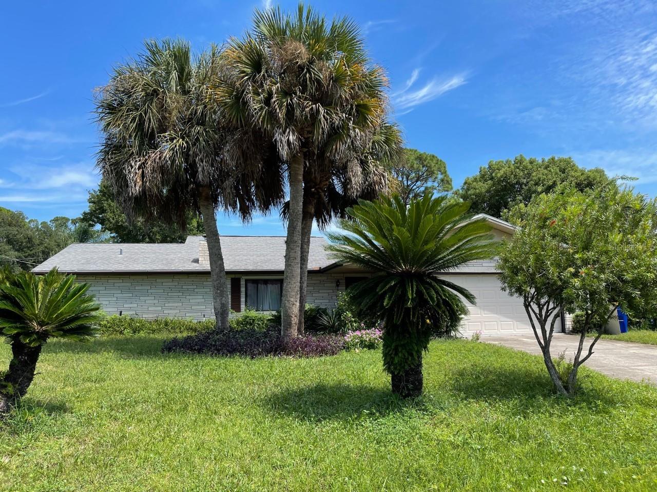 Lovely 3/2 inground pool home with large patio for afternoon BBQ's.  Enjoy the spacious layout in this concrete block split plan home w/large family room--great for the kids or entertaining!  Tile flooring throughout and lovely corner fireplace in the living area makes this a very warm and welcoming home. ;Water: City