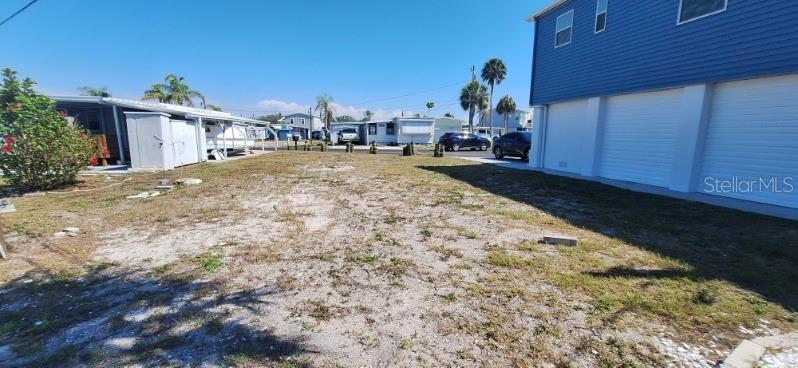 Build Your Dream Waterfront Escape – Dock, Lift & Gulf Access!

Geotechnical test completed for a future elevated home project. Cleared and ready for new construction, this direct waterfront lot in the desirable Sea Horse Mobile Home Park offers an excellent opportunity to create your ideal coastal retreat. The property provides quick access to the bay and Gulf with no fixed bridges.

Features include a new private dock and regularly serviced 9,000-pound boat lift, ideal for boating enthusiasts—keep your boat right in your backyard and enjoy easy access to John's Pass and surrounding waters.

HOA fee of $250/month includes water, sewer, trash, lawn maintenance, and access to the community heated pool and clubhouse.

Conveniently located less than a mile from the St. Petersburg VA Medical Center and under 5 miles to Gulf beaches. Enjoy easy access to the Pinellas Trail, and walk to Target and Doc Ford's Rum Bar & Grille. Just 15 minutes to downtown St. Petersburg and approximately 30 minutes to area airports.

Located in a sought-after 55+ community offering a true Florida waterfront lifestyle.

Buyer to verify all information and perform due diligence regarding building requirements and feasibility. Seller makes no warranties or guarantees.