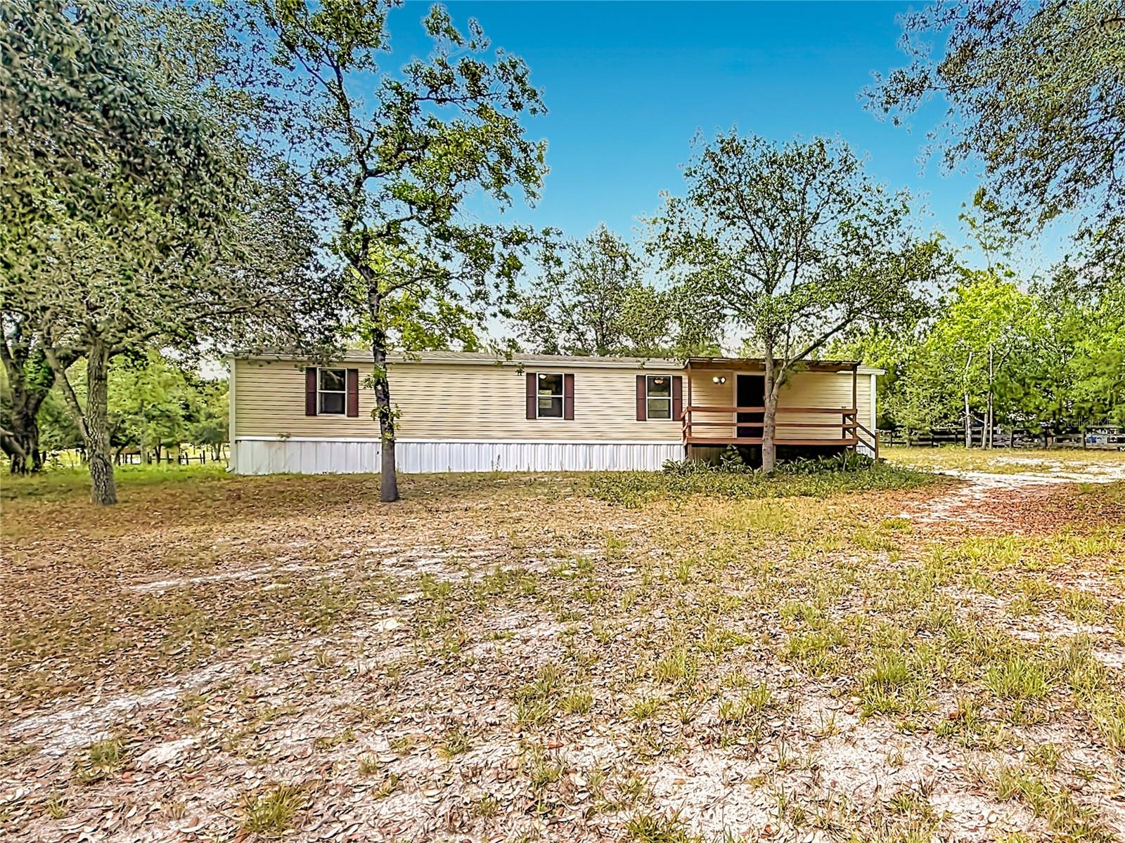 Peaceful country living in the heart of North Central Florida! Nestled between Williston and Dunnellon, this property offers the perfect blend of privacy, open space, and convenience. Located in the quiet outskirts of Morriston, you’ll enjoy a more relaxed lifestyle surrounded by nature, beautiful farmland, and star-filled skies at night. Just a short drive to the Rainbow River in Dunnellon for kayaking, tubing, boating, and outdoor adventures, while still being close to grocery stores, dining, and everyday essentials. Conveniently located within reach of Ocala and the World Equestrian Center, making it a great option for equestrian enthusiasts, outdoor lovers, or anyone looking to escape the hustle and bustle of city life. Enjoy nearby springs, parks, trails, and endless opportunities for recreation while still being centrally positioned between the Gulf Coast, Ocala, and Gainesville. If you’ve been searching for peaceful country charm with room to breathe, this location is a must-see!