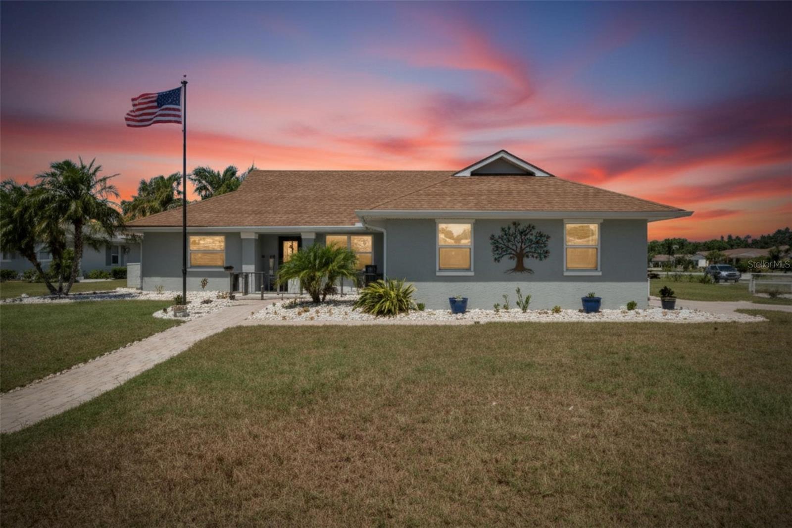 2002 E View Drive | 3 Bedrooms | 2 Bathrooms | Office | Lake View | 2,037 Sq Ft

Welcome to 2002 E View Drive in the highly sought-after Caloosa Country Club Estates section of Sun City Center—a completely renovated lakeview home offering luxury finishes, modern design, and active adult living. This meticulously maintained 3-bedroom, 2-bathroom home with a dedicated office, 2-car garage, and 2,037 square feet of beautifully updated living space is truly move-in ready.

Situated on a spacious corner lot with a side-facing garage and inviting front courtyard, this stunning residence features an open split-bedroom floor plan with vaulted ceilings, plank tile flooring throughout, abundant natural light, and designer finishes at every turn. The private office with French doors offers the perfect flex space for working from home, hobbies, or a reading retreat.

The fully remodeled chef’s kitchen is the centerpiece of the home and showcases a large island with breakfast bar, stylish pendant lighting, custom wood panel detailing, stainless steel appliances including a French door refrigerator, slide-in range with stainless steel range hood, custom cabinetry with 42-inch uppers, crown molding, pantry cabinet, wine storage, pot drawers, pull-out recycling and garbage cabinet, and stunning glass tile backsplash. Electrical has already been installed for future recessed lighting if desired.

The spacious primary suite is a luxurious retreat featuring crown molding, sliding glass doors to the patio with peaceful lake views, a large walk-in closet, and a spa-inspired en-suite bathroom with dual quartz vanities, custom cabinetry, and an oversized glass-enclosed walk-in shower with rain shower head, designer tile accents, and tile extending to the ceiling. The guest bathroom has also been beautifully renovated with quartz countertops and a large glass-enclosed shower with floor-to-ceiling tile. One guest bedroom features sliding doors leading directly to the screened patio, creating an ideal guest retreat.

Additional upgrades include all new hurricane-rated windows, electrical panel replacement in 2023, appliances replaced in 2022, and patio rescreened in 2026. The large laundry room includes built-in cabinetry and a utility sink for added functionality. Relax and enjoy tranquil lake views from the screened patio while embracing the peaceful Florida lifestyle.

Located within the desirable Caloosa Country Club Estates neighborhood, residents enjoy low HOA fees and optional membership to the exclusive Caloosa Country Club, providing flexibility to tailor amenities and lifestyle preferences. Sun City Center is one of Florida’s premier active adult communities featuring multiple clubhouses, pools, fitness centers, golf, tennis, pickleball, woodworking shops, art studios, and more than 200 clubs and social organizations. Exciting community enhancements are underway, including a brand-new arts and crafts building opening this year and a new indoor resort-style pool planned for 2027.

Conveniently located near I-75, US-301, and US-41, this golf cart-friendly community offers easy access to shopping, dining, medical facilities, churches, banking, and entertainment. You’re also just a short drive from Tampa, Sarasota, St. Petersburg, MacDill Air Force Base, award-winning Gulf Coast beaches, professional sports venues, VA hospitals, and three international airports. Luxury active adult living at its finest—schedule your private showing today!