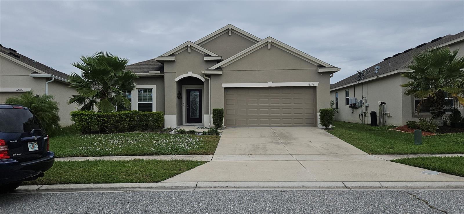 Beautiful 4/2 open floor plan in Sawgrass Plantation community, very well kept and maintained, freshly painted inside and shampooed carpet,  this home is ready for you to move-in.  Enjoy the privacy of a large backyard that is fully fenced, or mingle with community members at the pool, basketball and tennis' courts and 2 playgrounds.. This community is located within minutes of walking trails and easy access to major roads, making commute to Downtown Orlando, Orlando International Airport and Lake Nona VA Hospital a breeze.  Schedule your showing today and come check this home, you will love what you'll see!