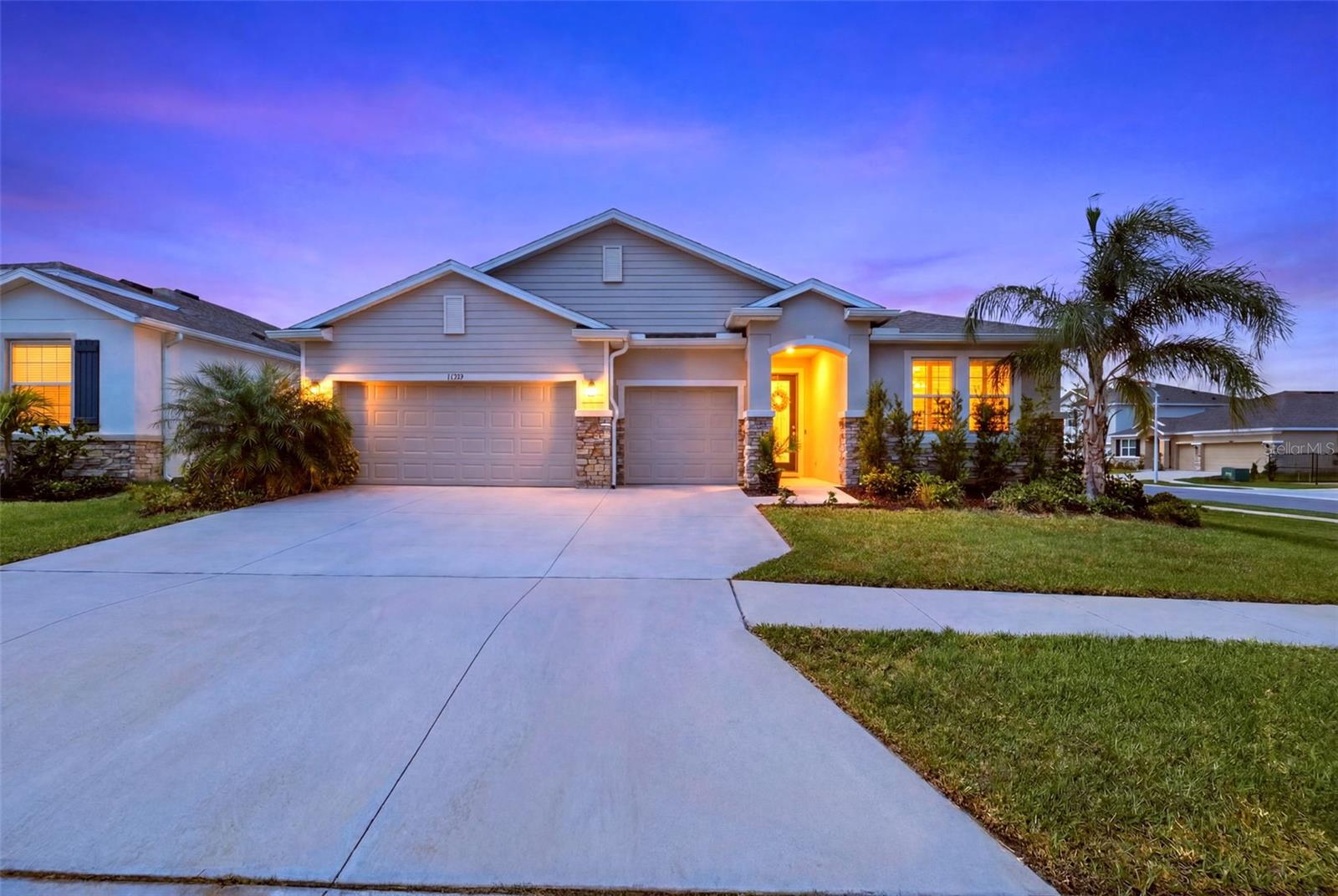 Situated on a premium corner lot in the heart of the highly sought-after Epperson Lagoon community, this rare Camden model offers the ultimate in flexible living, including a true multigenerational suite.
Welcome to resort-style living at its finest. This stunning home offers 4 bedrooms, 4 bathrooms, a 3-car garage and approximately 2800sq ft of beautifully designed single-story living that checks every box. From the moment you step inside, this home makes a statement. A generous foyer welcomes you with soaring ceilings, gleaming tile floors, and an immediate sense of space and light. The corner lot, additional windows and open-concept layout flow naturally, delivering the kind of bright, airy feeling that makes every day feel effortless.
This model’s standout feature is its fully equipped multigenerational suite, complete with its own private kitchen, a generous sized bedroom with its own full ensuite bathroom.
A full independent unit within the home means complete independence for extended family, in-laws, or guests, without ever compromising on comfort or privacy. The multi-gen layout offers separation and independence without leaving home. 
Two additional bedrooms share a jack-and-jill full bathroom at the front of the home, while the primary owner’s suite sits privately at the rear, offering beautiful backyard views. Master Ensuite has a double vanity, separate shower and tub and a large walk-in closet. 
The main chef’s kitchen flows seamlessly into a spacious great room with a formal dining room and dinette, all overlooking a covered lanai perfect for extending entertaining outdoors. HOA includes lagoon access and cable tv.
All of this within Epperson, home to the incredible 7.5-acre Crystal Lagoon with a swim-up bar, water slide, kayaking, paddleboarding, and private cabanas.  The community also features a 5-acre dog park, playground, Zen garden, and community Wi-Fi hotspots.  
Residents can also enjoy access to the second lagoon at a nominal per-day fee. 
Ideally located with easy access to top-rated schools, major highways, healthcare, shopping, close to the new Publix, and the largest Target in the country, plus with so many dining and entertainment options, everything you need is within reach. 
This is more than a home, it’s a lifestyle built for the way families actually live today. Don’t miss this rare opportunity to own this beautiful property with space for everyone you love, and a lifestyle that feels like a permanent vacation. Book your showing today!