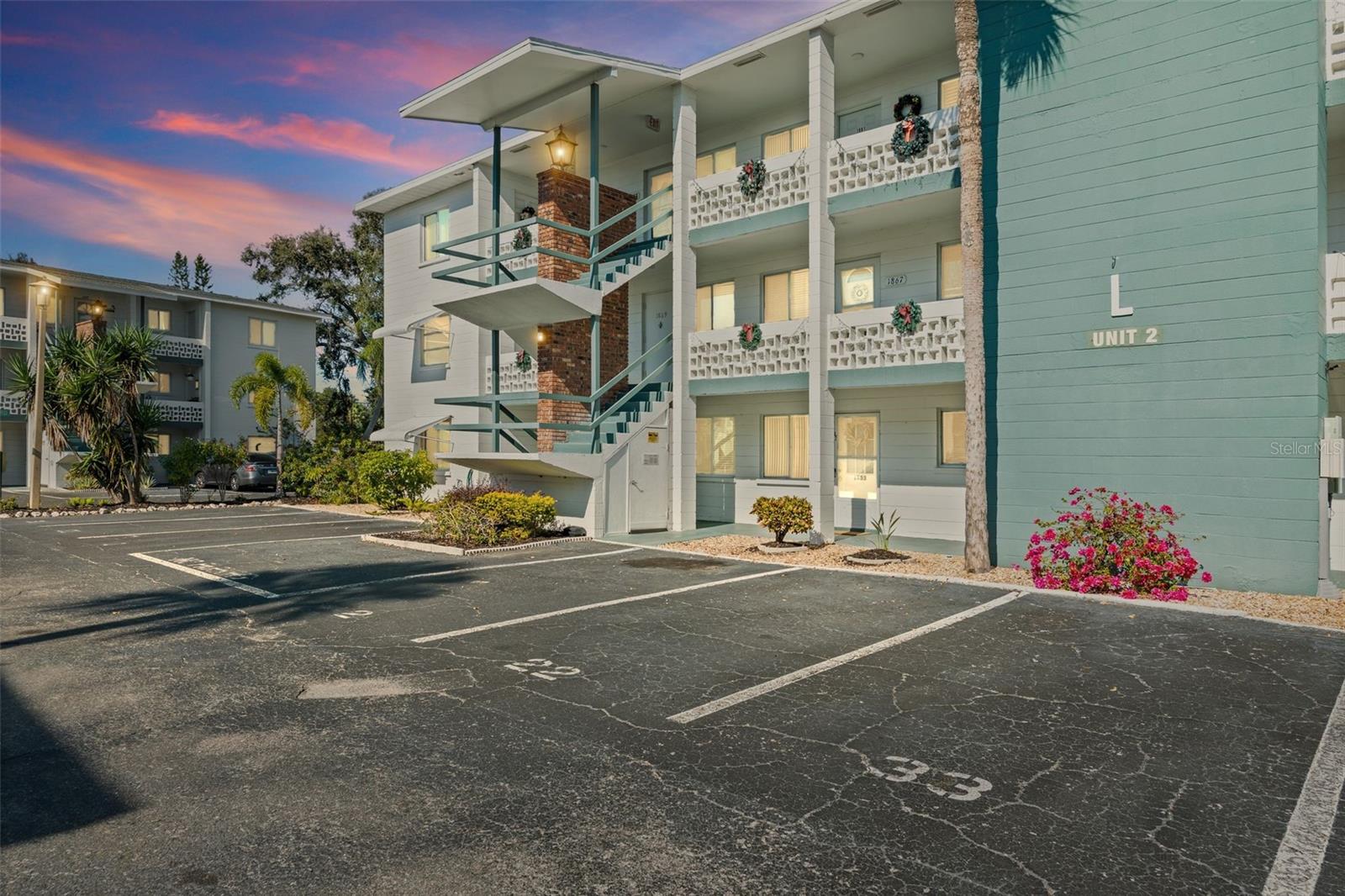 Welcome home to easy Florida living in this beautifully refreshed, first-floor condo located in the active and welcoming 55+ Bayshore community and best of all, NO STAIRS! This spacious two-bedroom, two-bath residence has been thoughtfully updated and is now being offered fully furnished, making it completely move-in ready for its next owner. Recent improvements include fresh interior paint throughout, updated electrical outlets, new fixtures adding a clean, modern feel to the space. Inside, you’ll find brand new ceramic tile flooring throughout the main living areas, complemented by matching luxury vinyl plank flooring in both bedrooms. The unit features its own oversized walk-in laundry room with abundant storage, a rare and convenient bonus. Enjoy peaceful mornings or relaxing evenings in your private enclosed sunroom, where you can sip your coffee and listen to the birds sing. Additional highlights include assigned parking directly in front of the unit, all new hurricane impact windows in each bedroom, and a 13-month home warranty offered to the buyer for added peace of mind. This amenity-rich community offers a pool, clubhouse, shuffleboard courts, and on-site laundry facilities, fostering a vibrant and social atmosphere. The location is unbeatable with walking distance to a brand-new Publix, Target, Chick-fil-A, TJ Maxx, plus additional shopping and dining. Bayshore Gardens is conveniently situated between Downtown Bradenton and Downtown Sarasota, with easy access to Sarasota-Bradenton International Airport, St. Armands Circle, golf courses, and world-famous Gulf beaches. Whether you’re searching for a winter retreat, full-time residence, or low-maintenance lifestyle, this charming and updated condo checks all the boxes. Why spend another cold winter up north when this turnkey Florida home is ready and waiting? Schedule your private showing today.